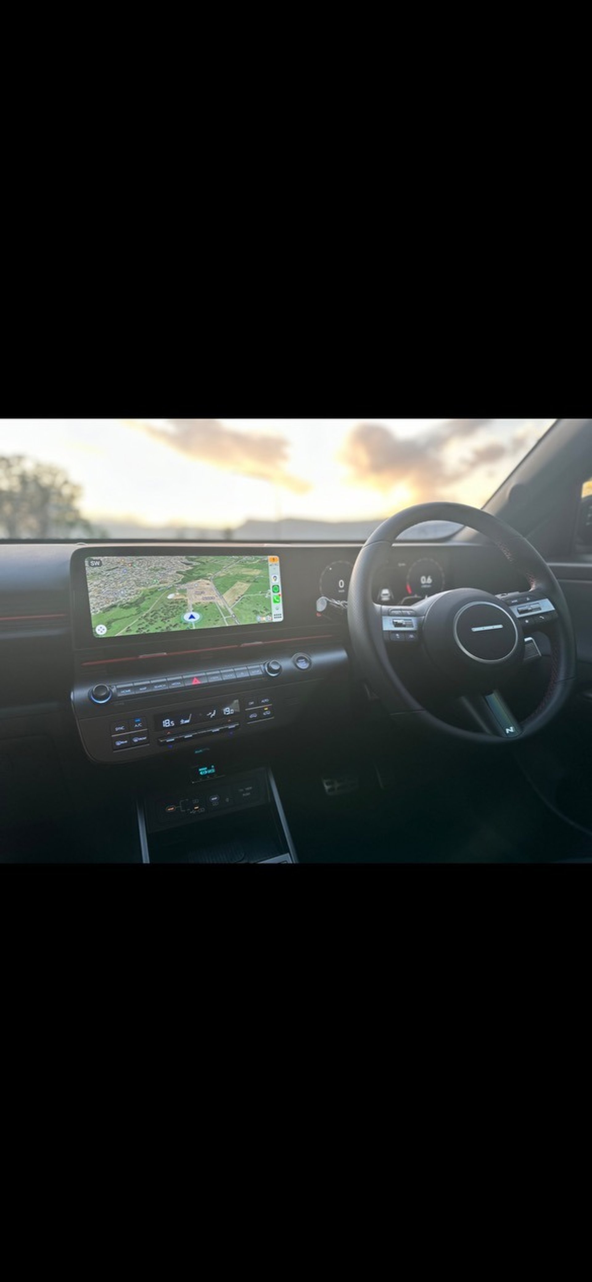 woman wearing yellow long-sleeved dress under white clouds and blue sky during daytime