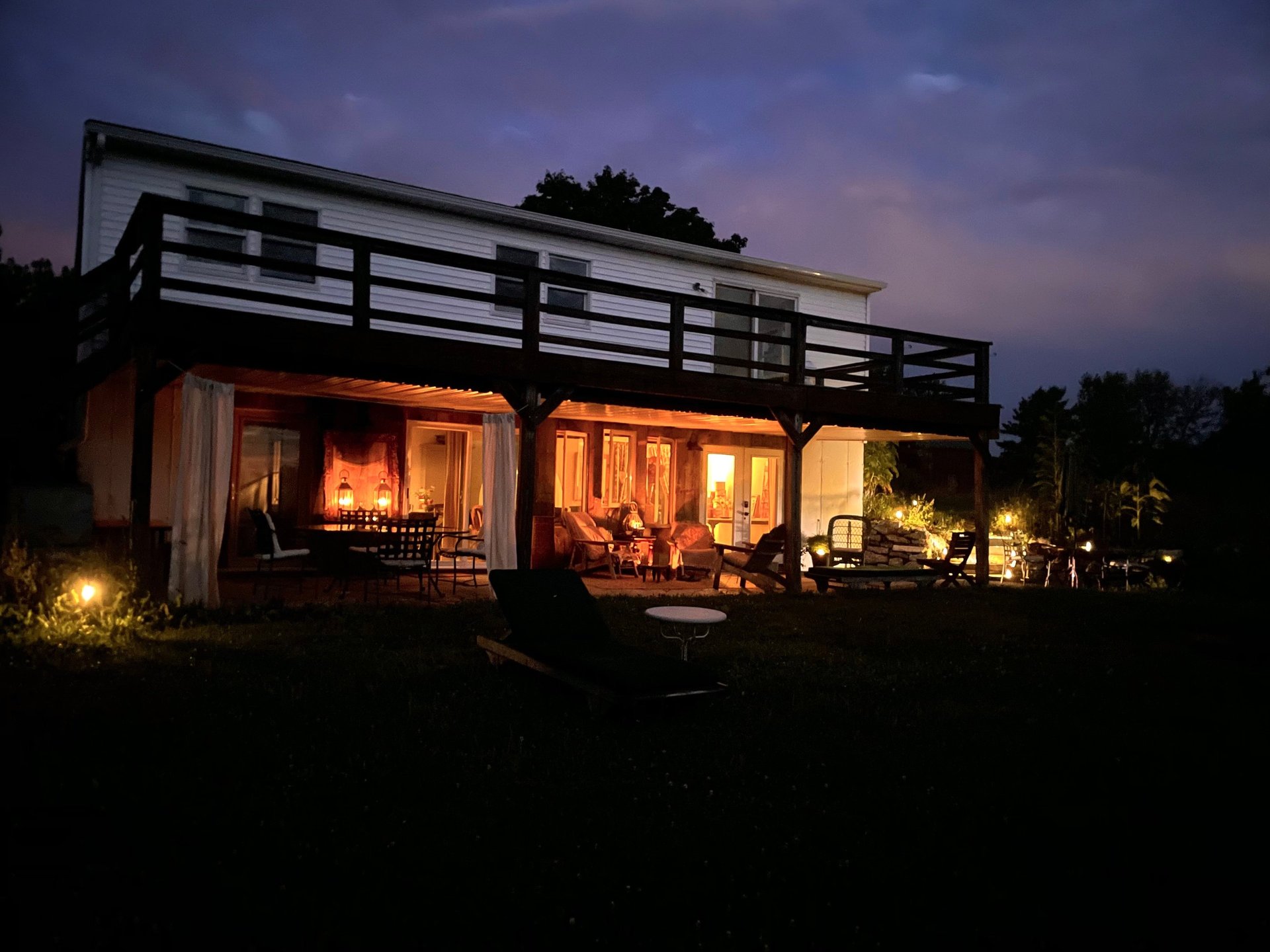 an abstract photo of a curved building with a blue sky in the background