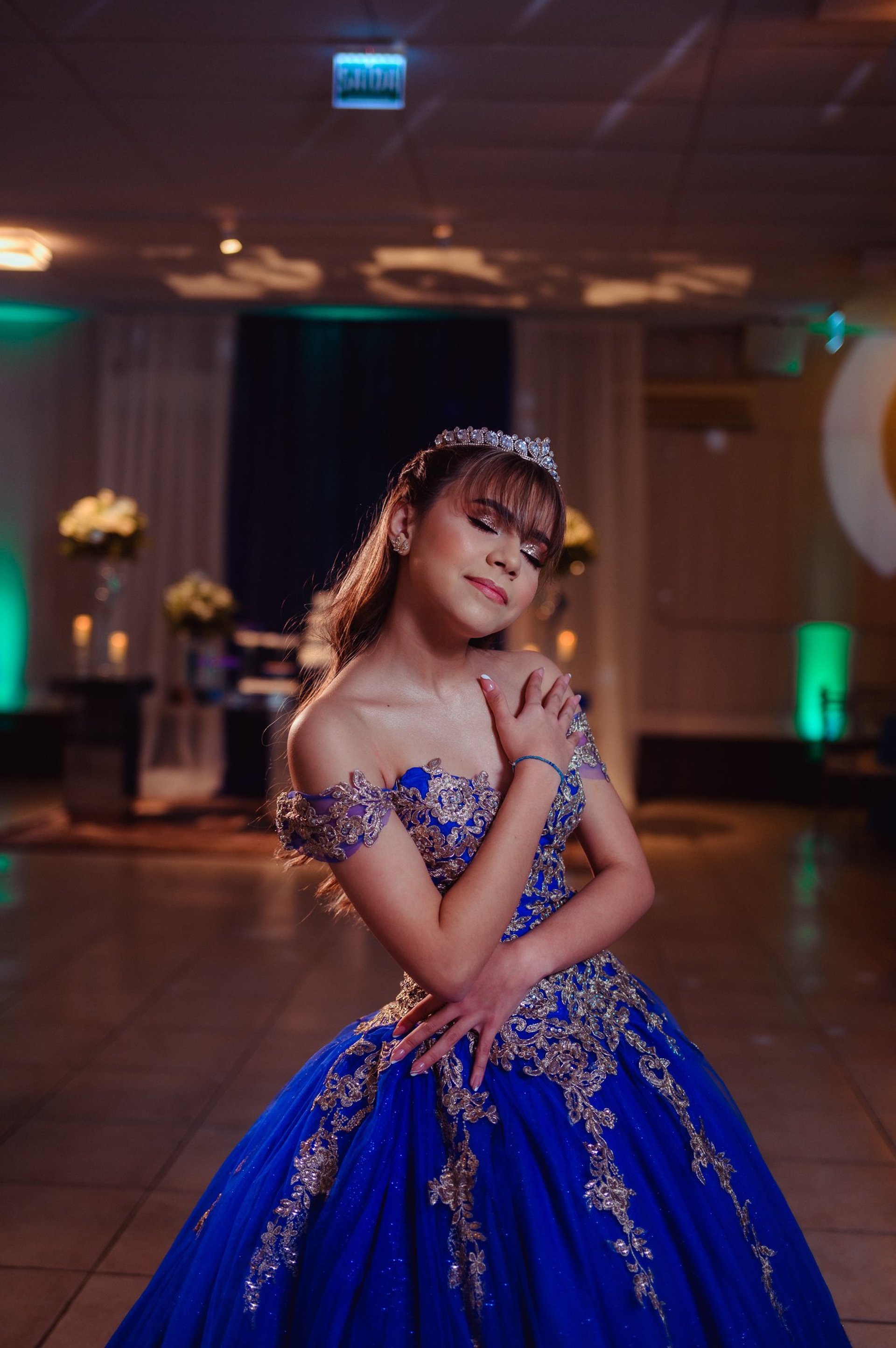 woman wearing yellow long-sleeved dress under white clouds and blue sky during daytime