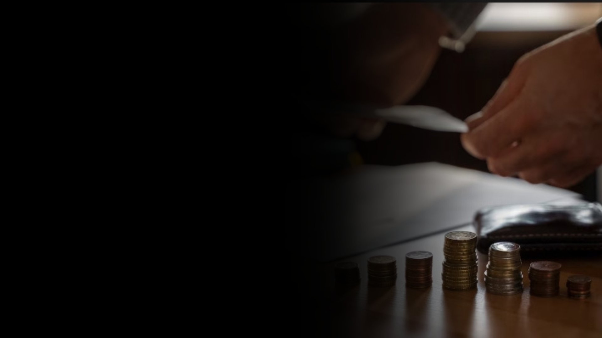 an abstract photo of a curved building with a blue sky in the background