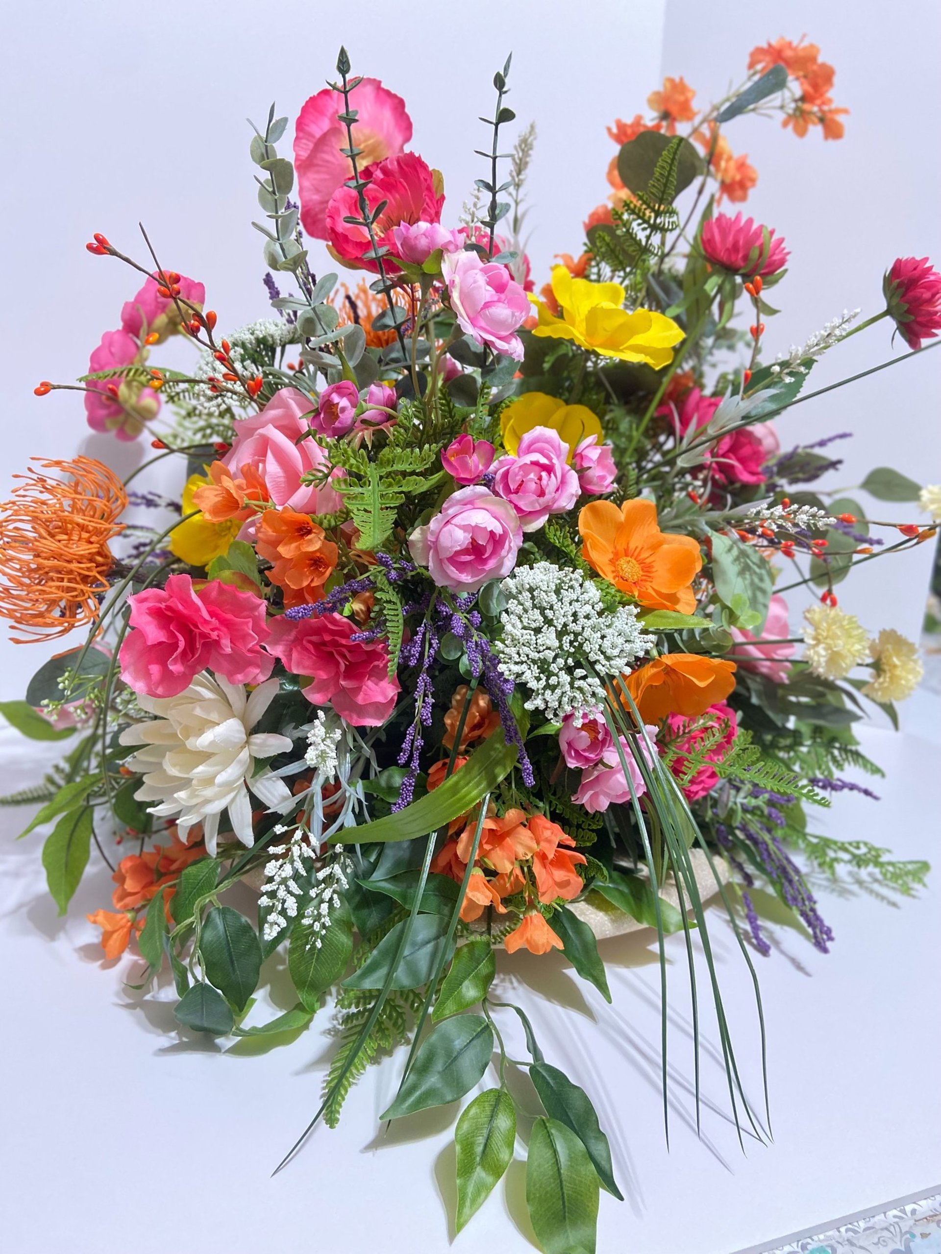 an abstract photo of a curved building with a blue sky in the background