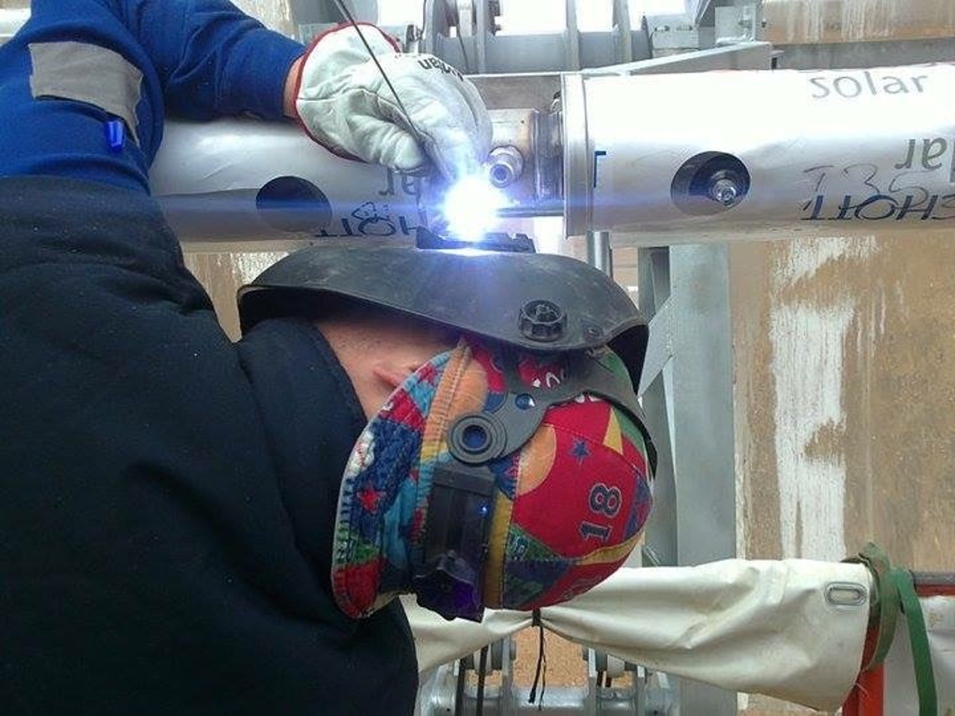 woman wearing yellow long-sleeved dress under white clouds and blue sky during daytime