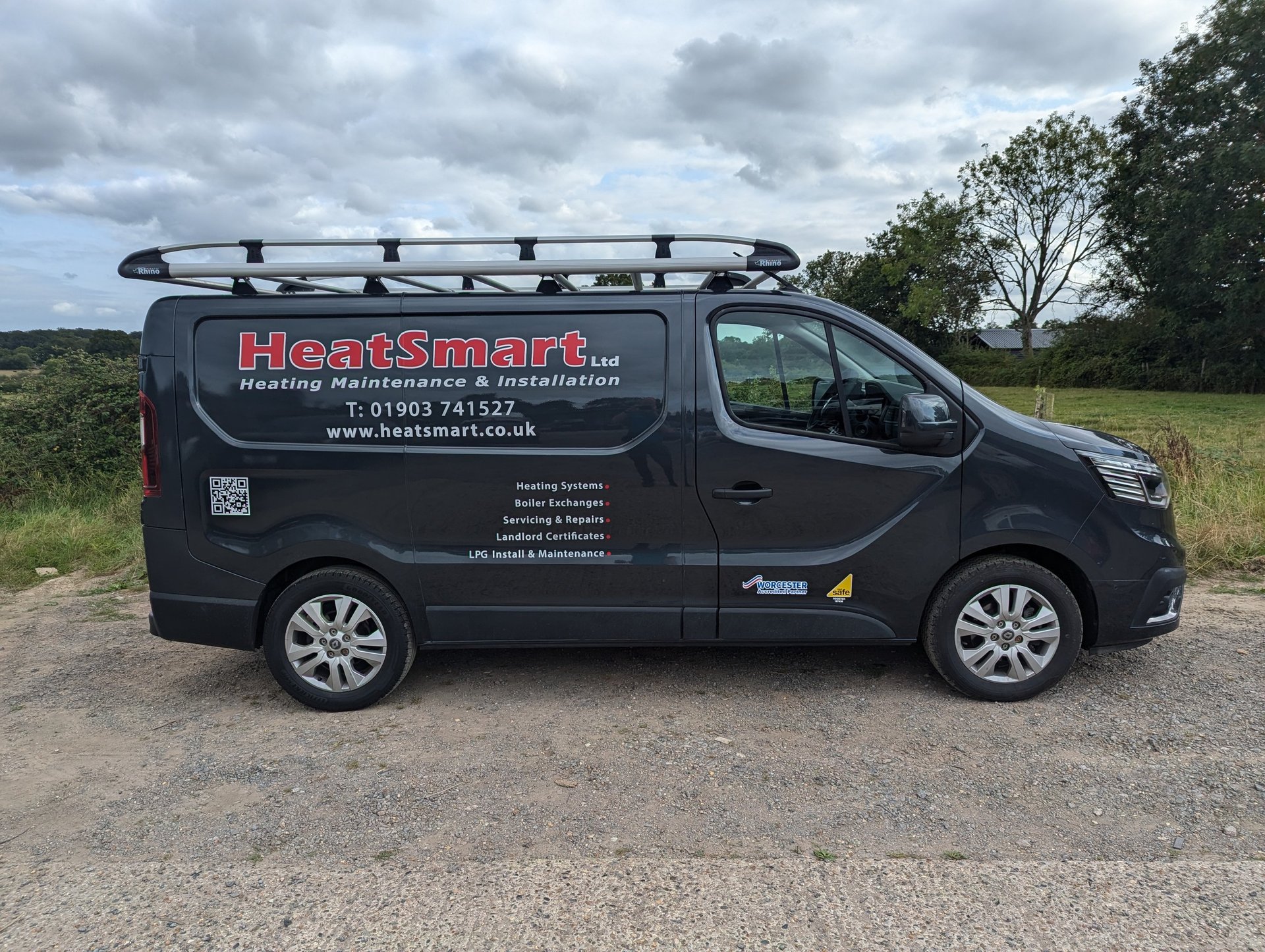 black and brown leather padded tub sofa