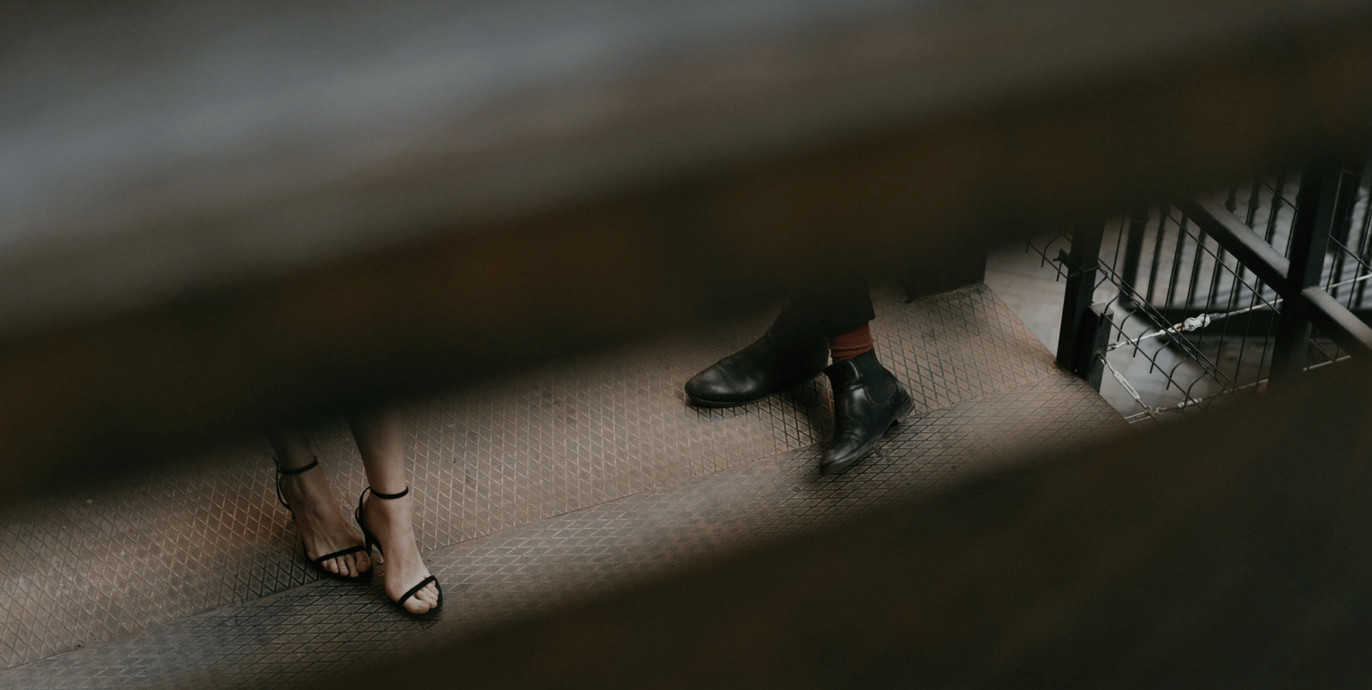 a close up of a black and brown abstract painting