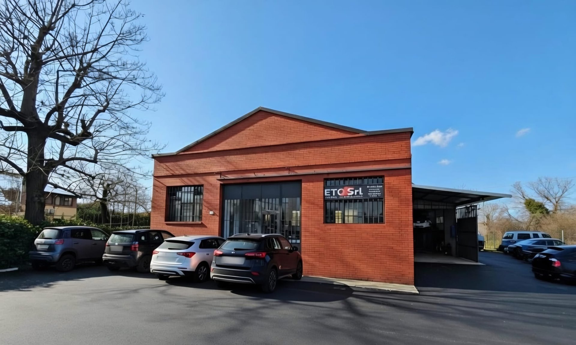 black and brown leather padded tub sofa