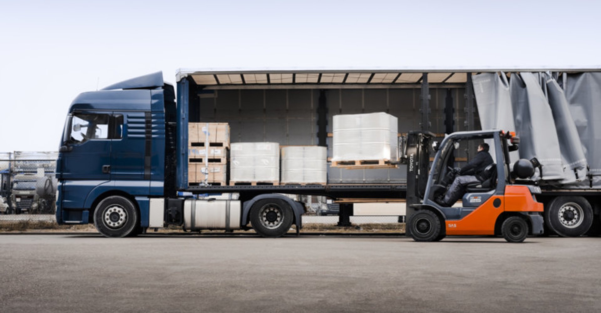 woman wearing yellow long-sleeved dress under white clouds and blue sky during daytime