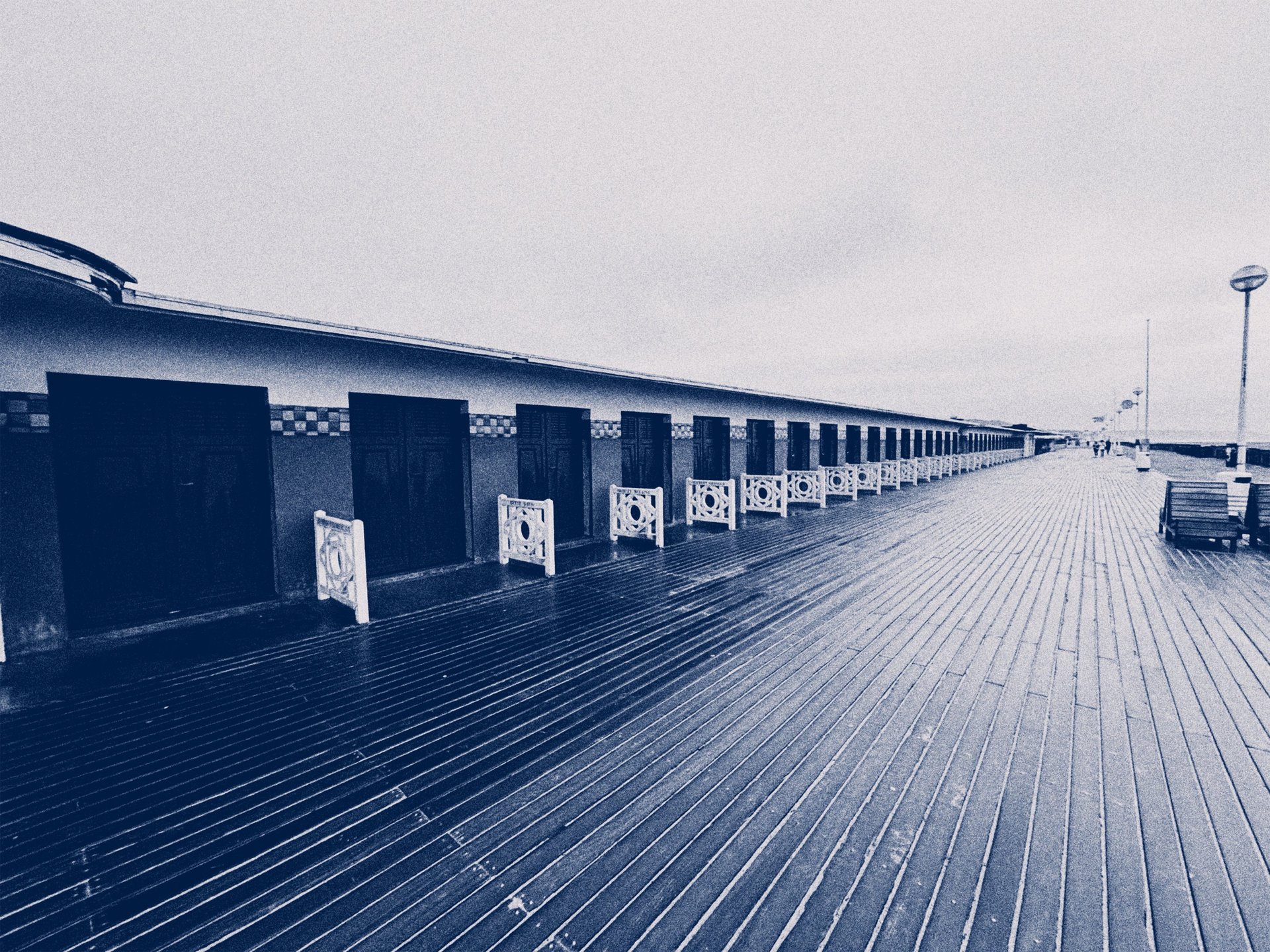 woman wearing yellow long-sleeved dress under white clouds and blue sky during daytime