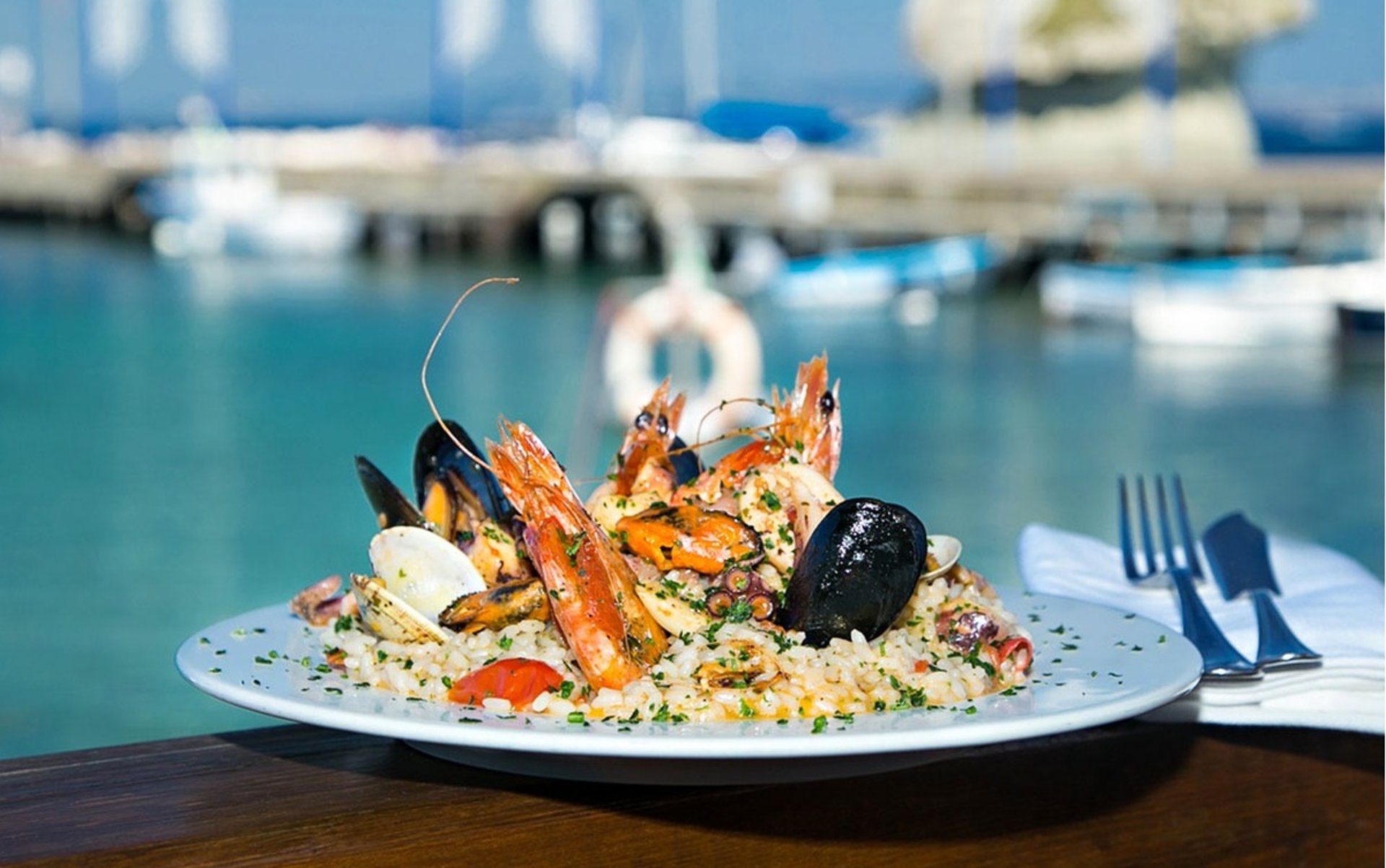 an abstract photo of a curved building with a blue sky in the background