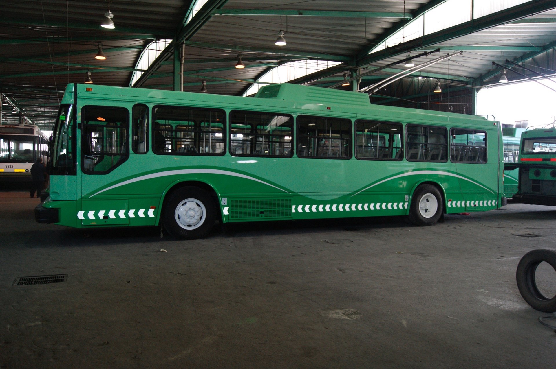 black and brown leather padded tub sofa
