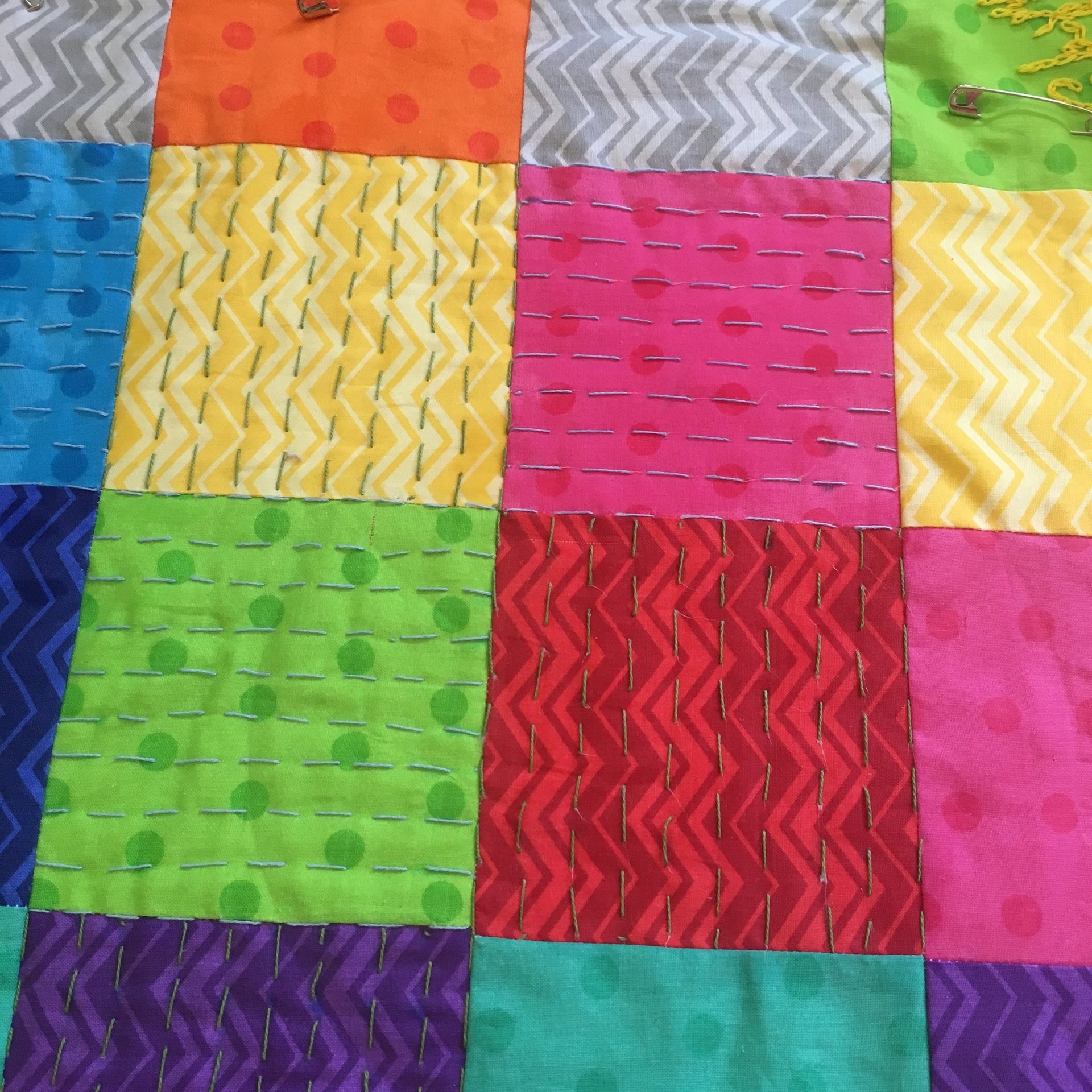 woman wearing yellow long-sleeved dress under white clouds and blue sky during daytime