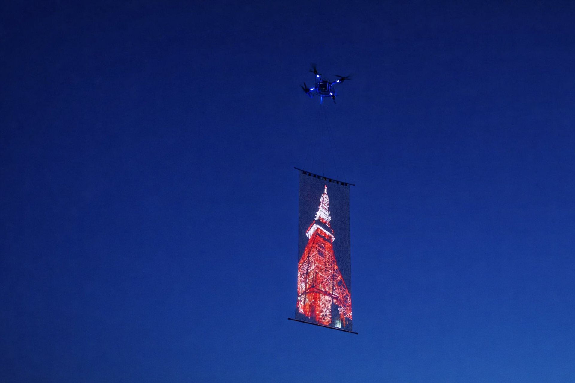 woman wearing yellow long-sleeved dress under white clouds and blue sky during daytime