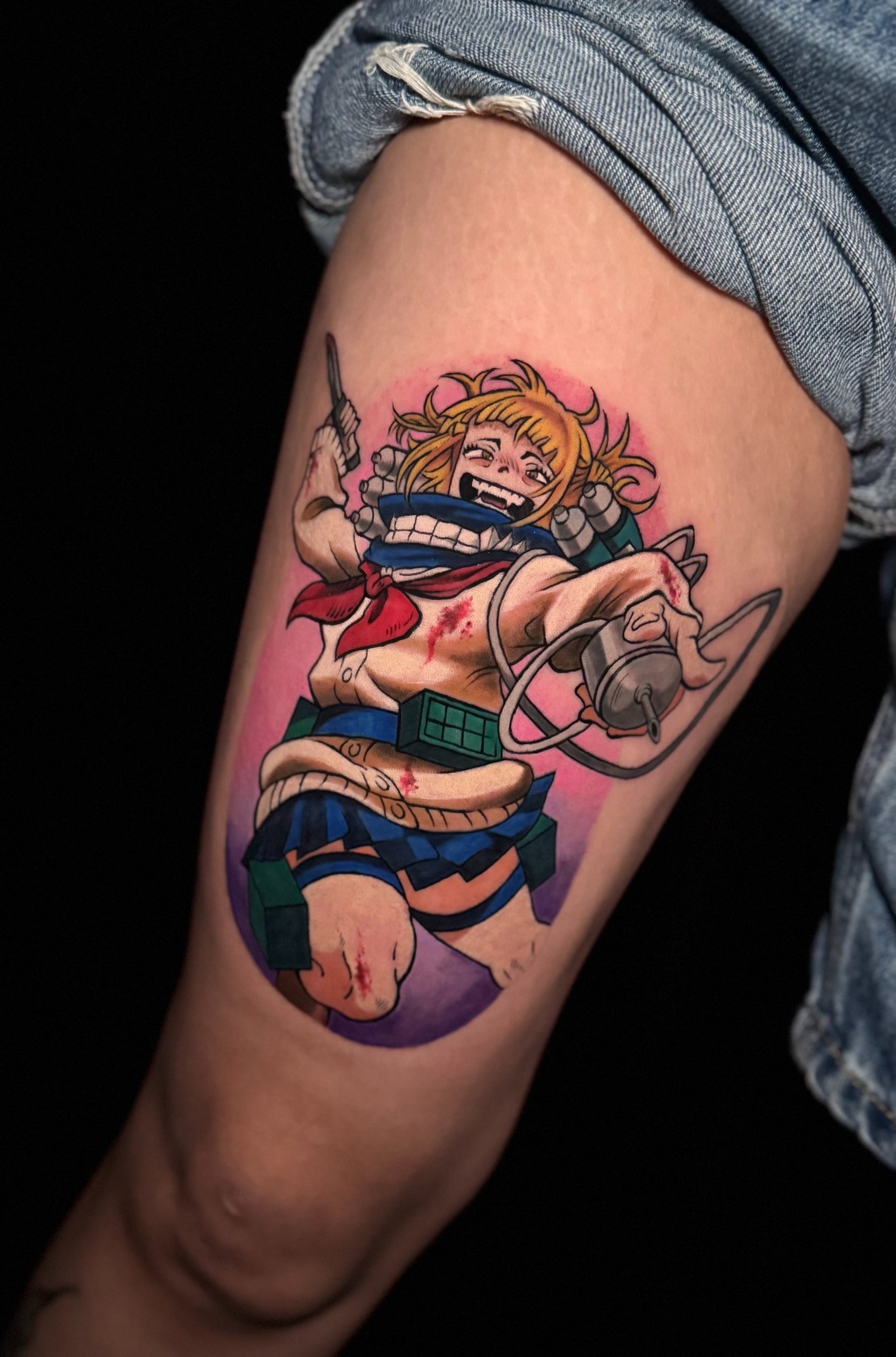 woman with black and brown floral tattoo on her back