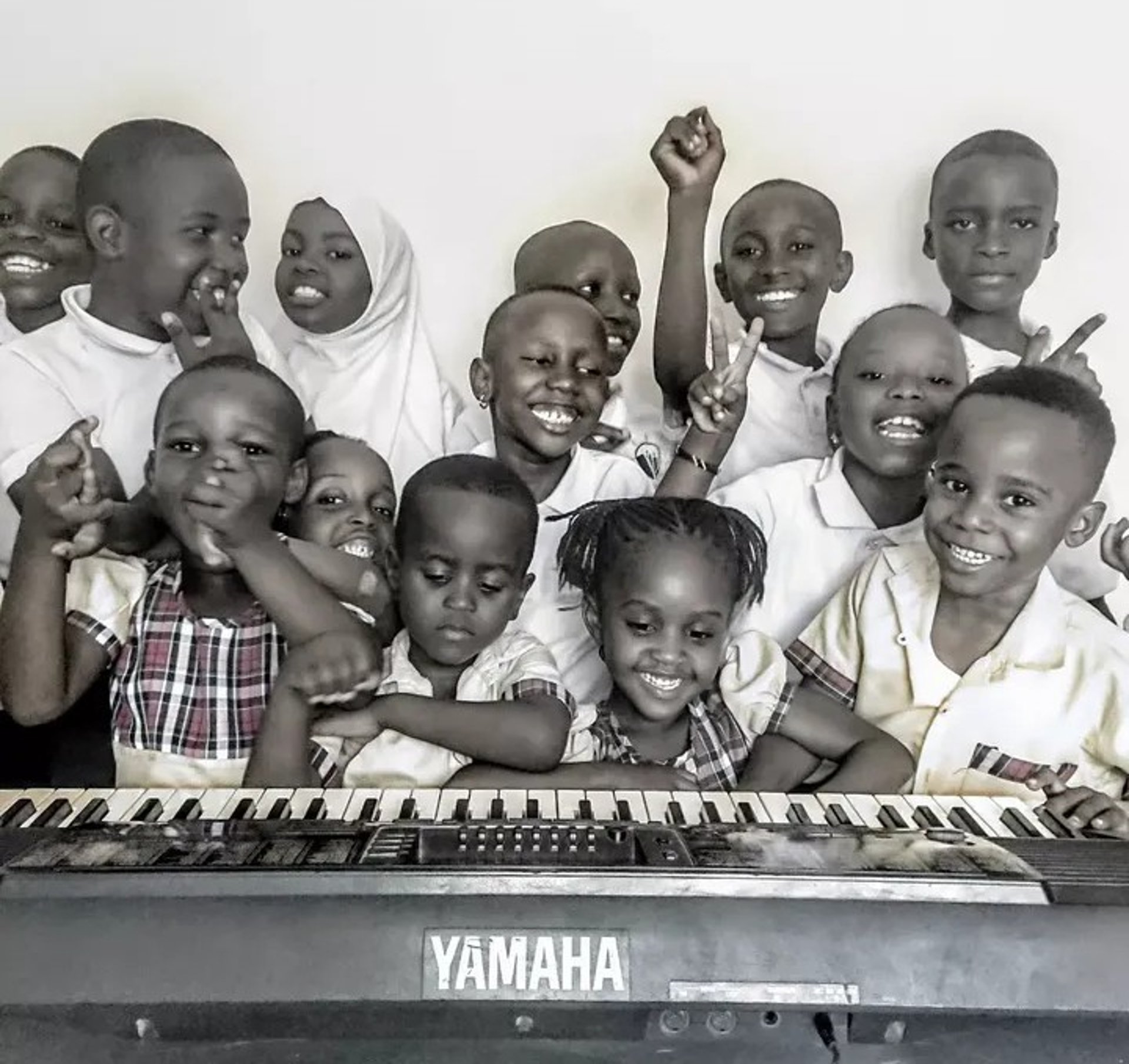 woman wearing yellow long-sleeved dress under white clouds and blue sky during daytime