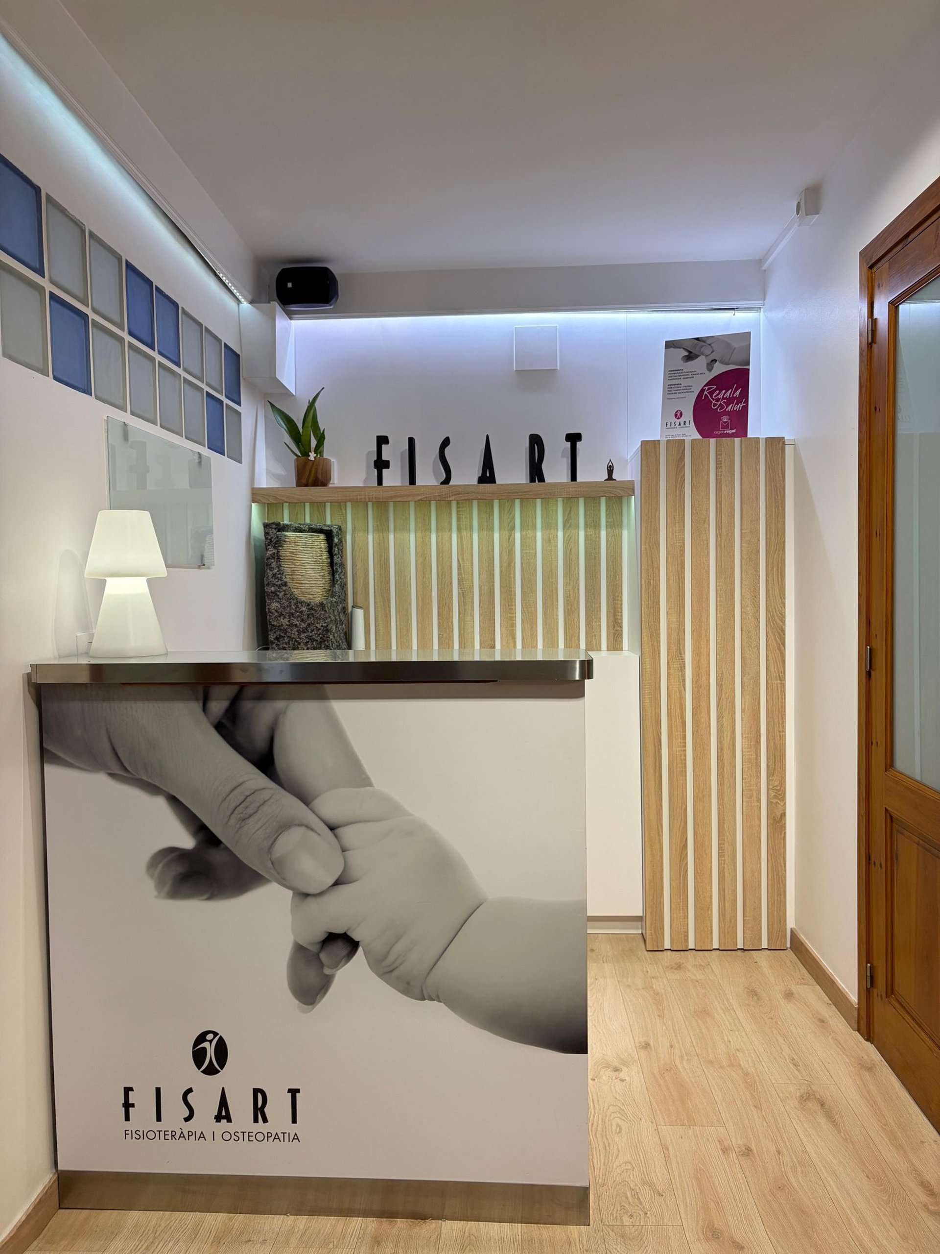 an abstract photo of a curved building with a blue sky in the background
