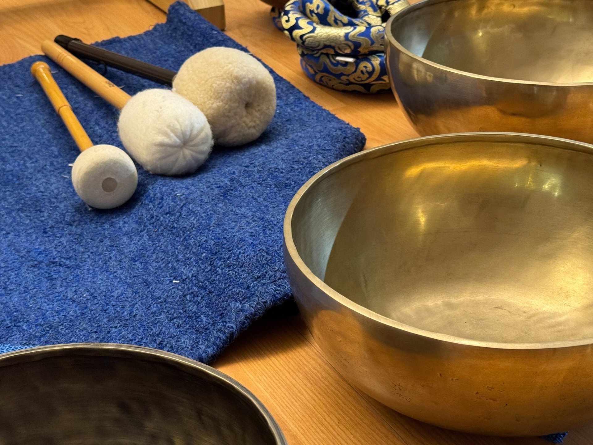 a black background with a blue wave of light