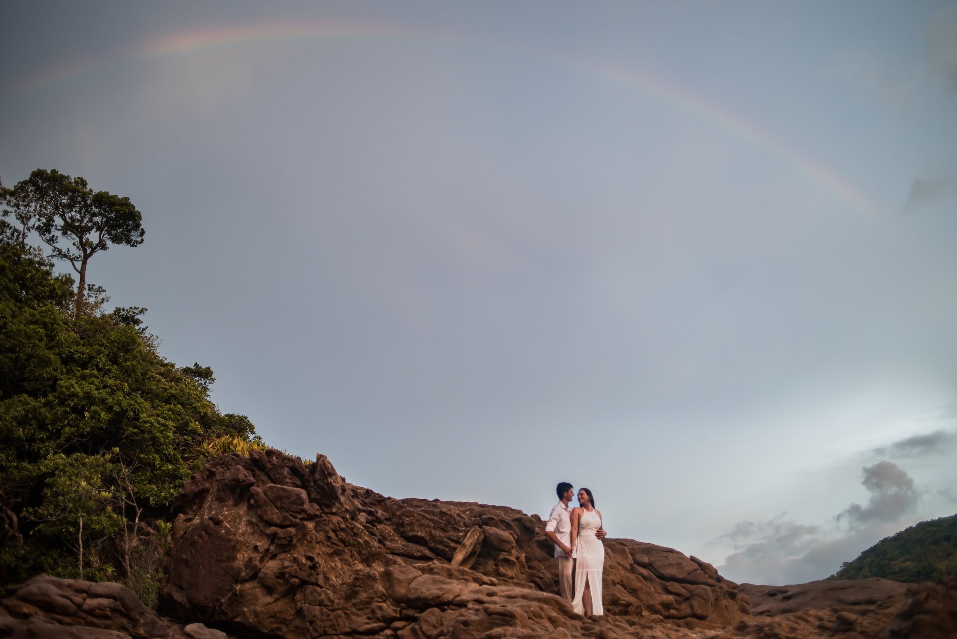 couple wearing silver-colored rings