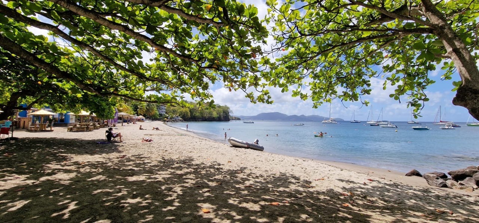 an abstract photo of a curved building with a blue sky in the background