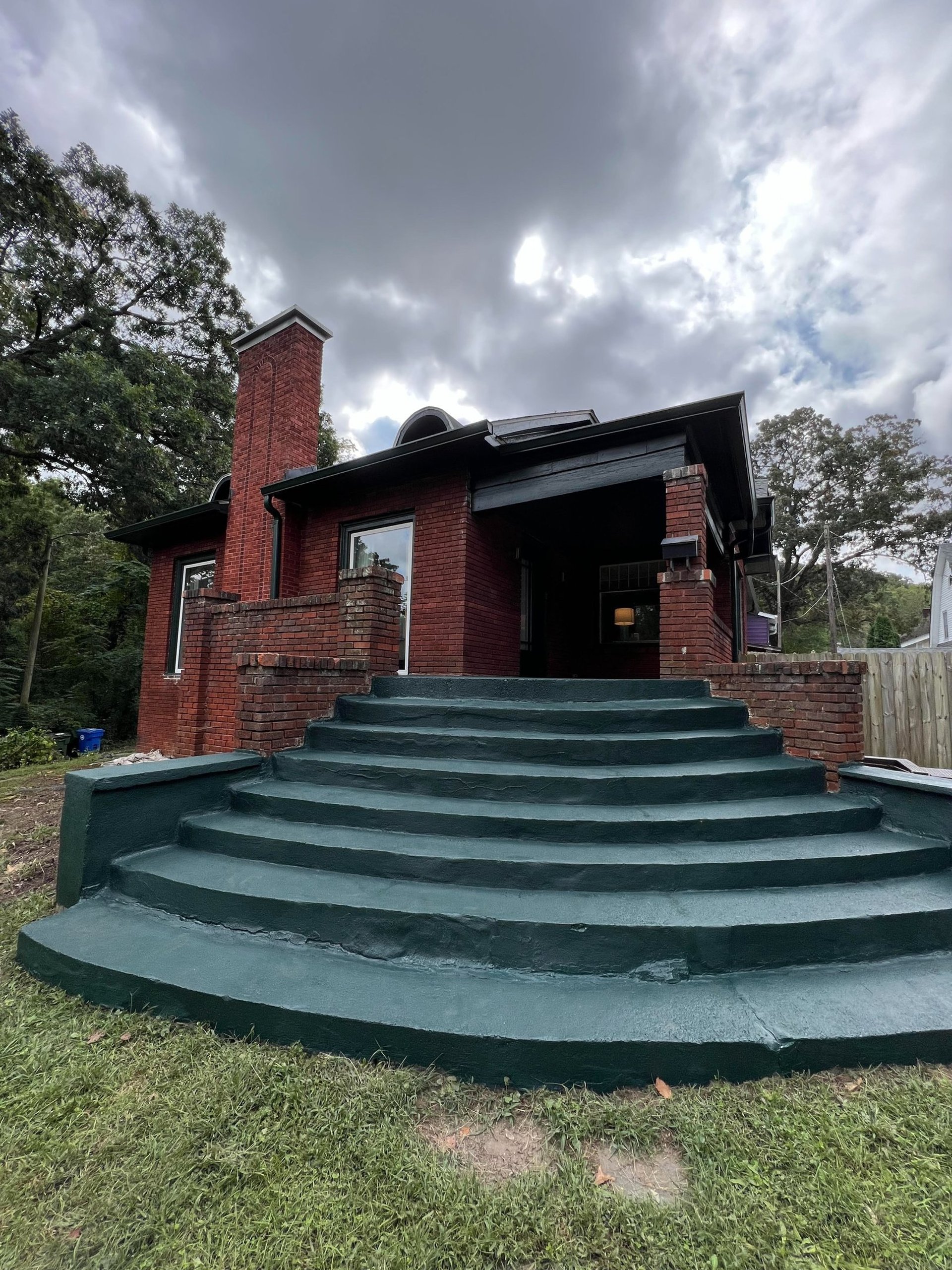 exterior brick home painted in west asheville