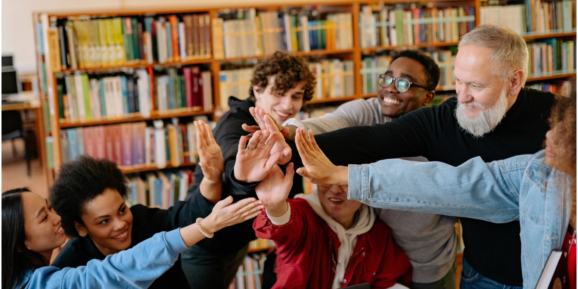 Mother and daughter studying together at a table.