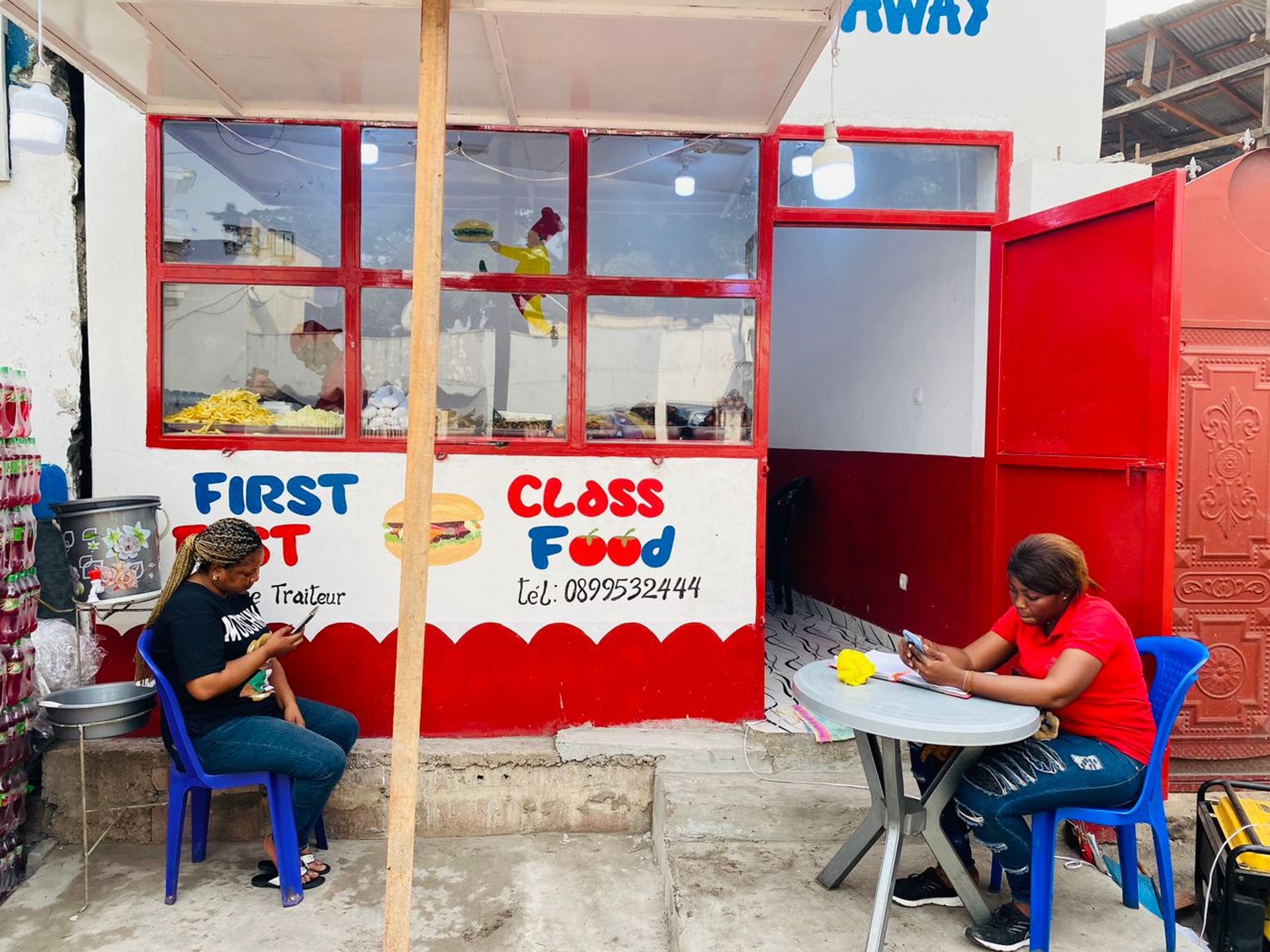 empty hallway between concrete buildings during daytime