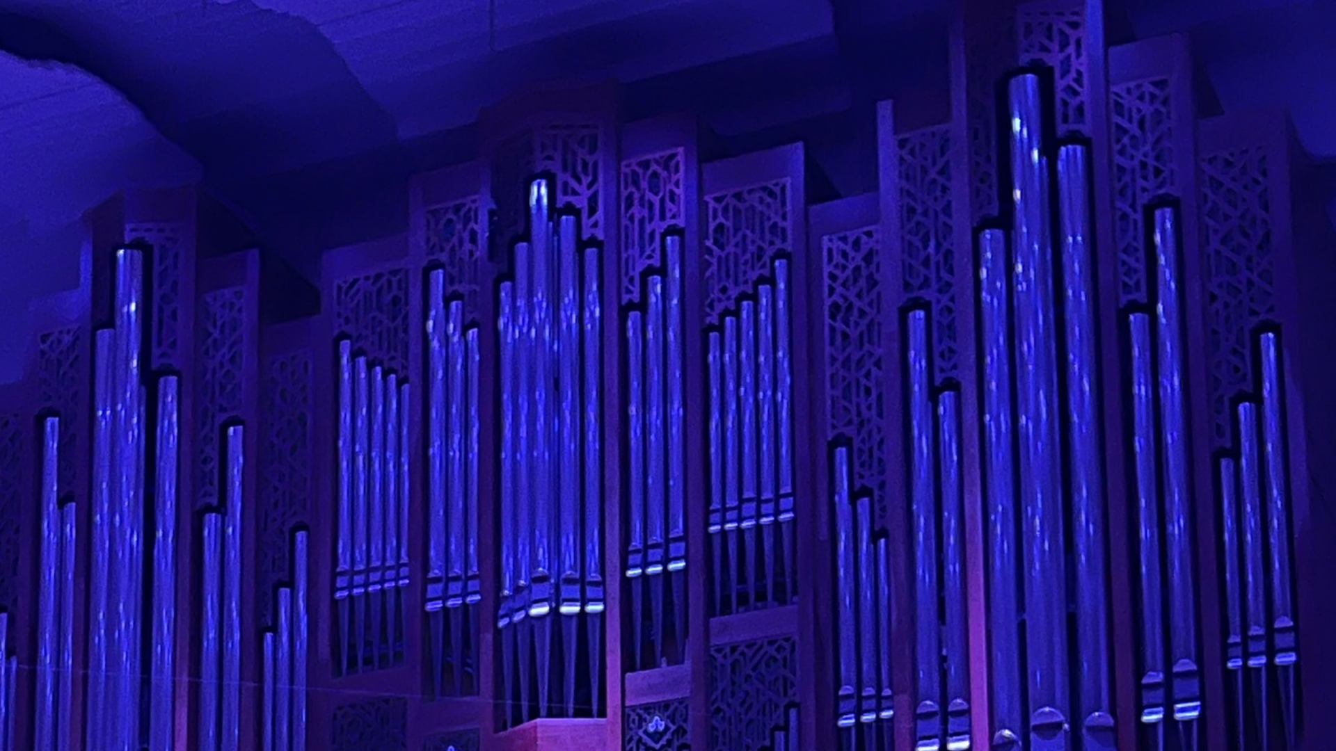 a close up of a black and brown abstract painting