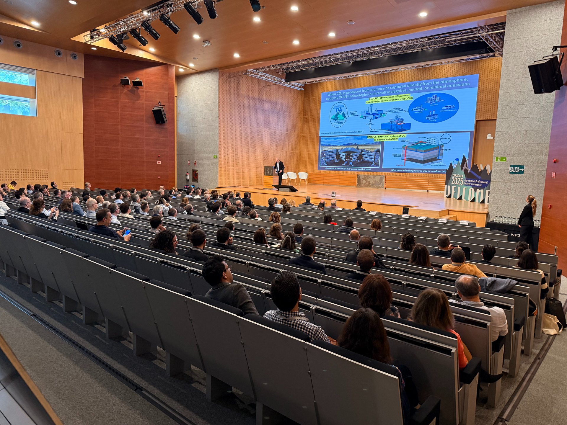 black and brown leather padded tub sofa