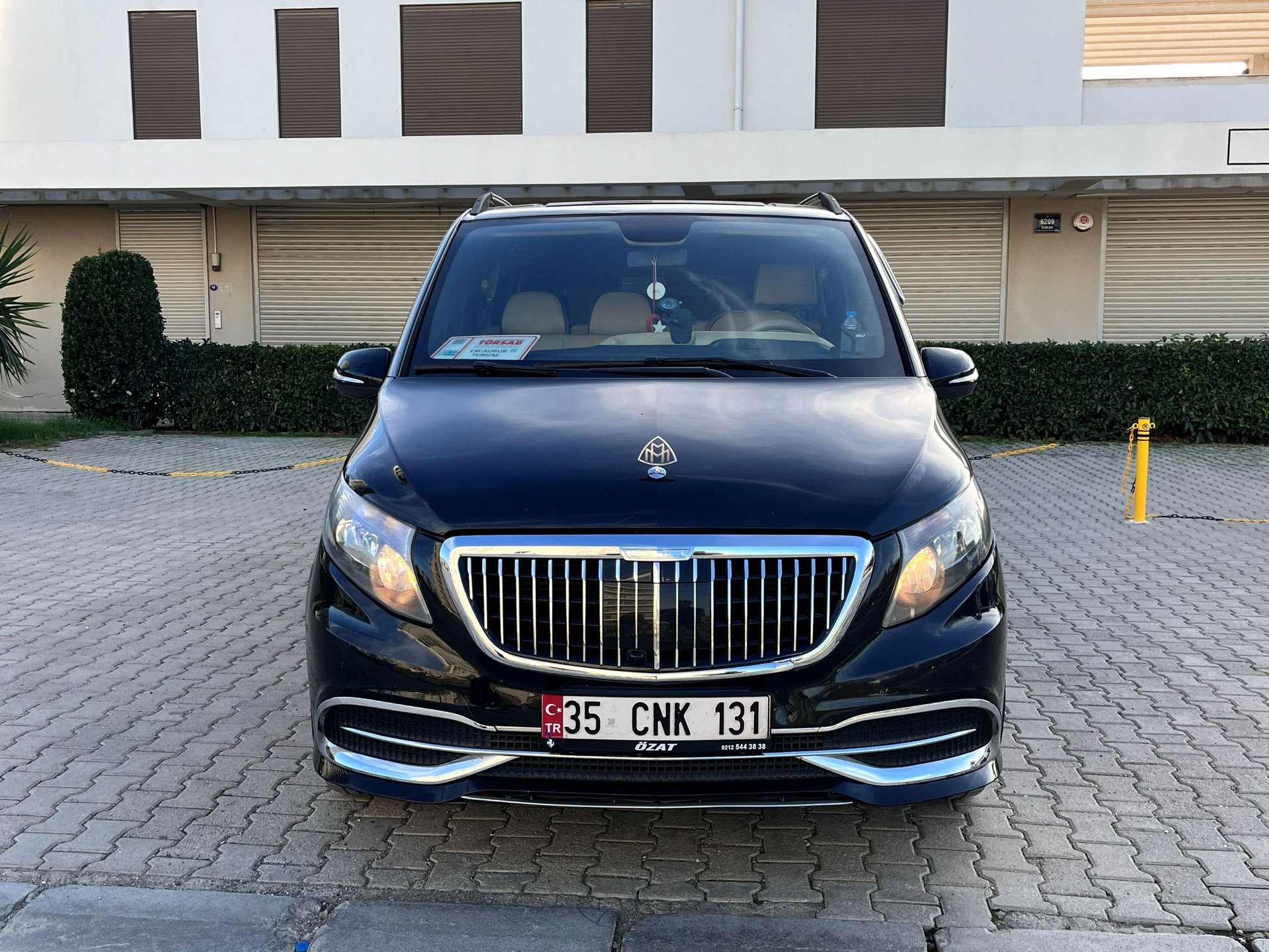 black and brown leather padded tub sofa