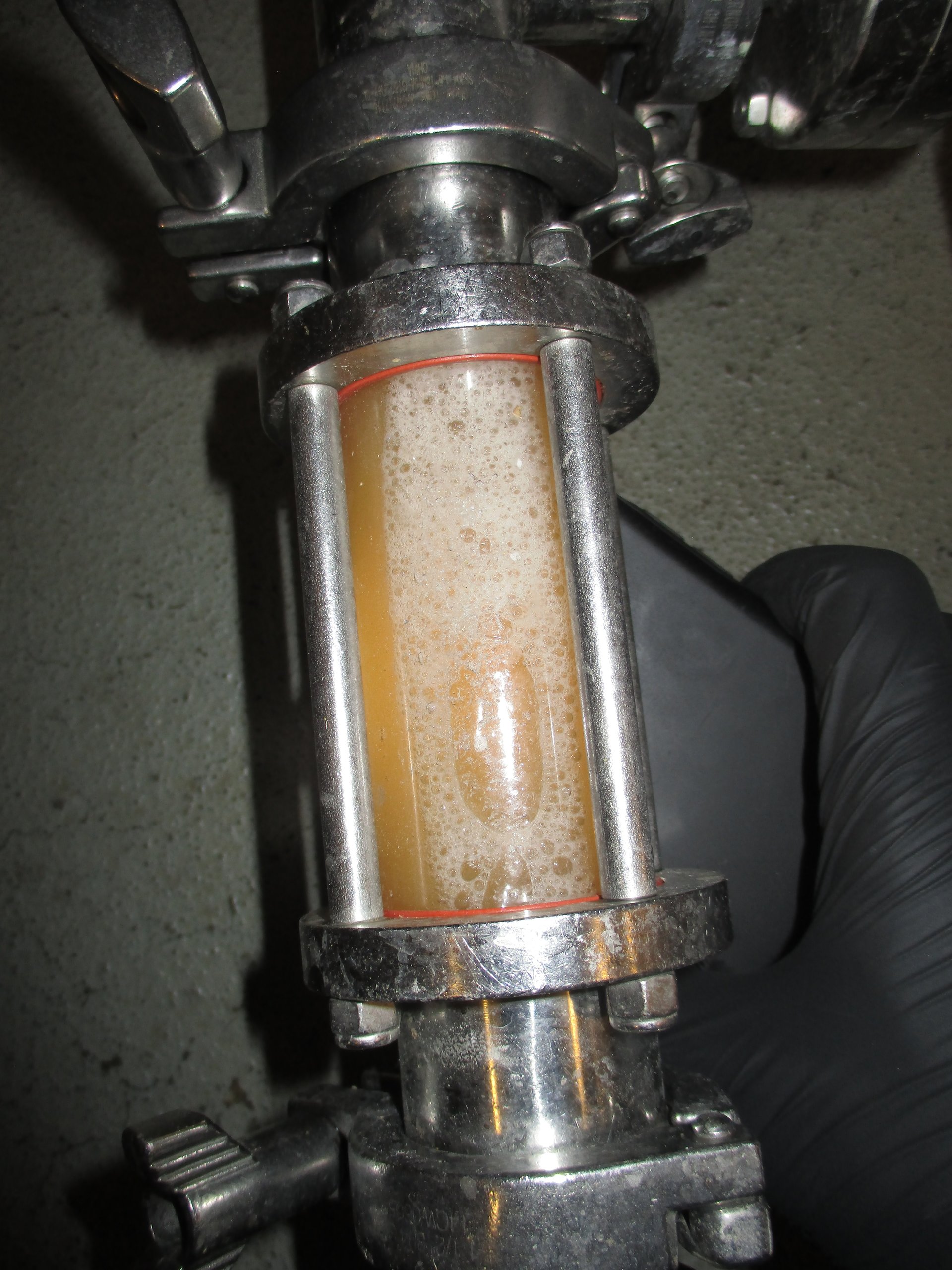 person wearing grey knit sweater