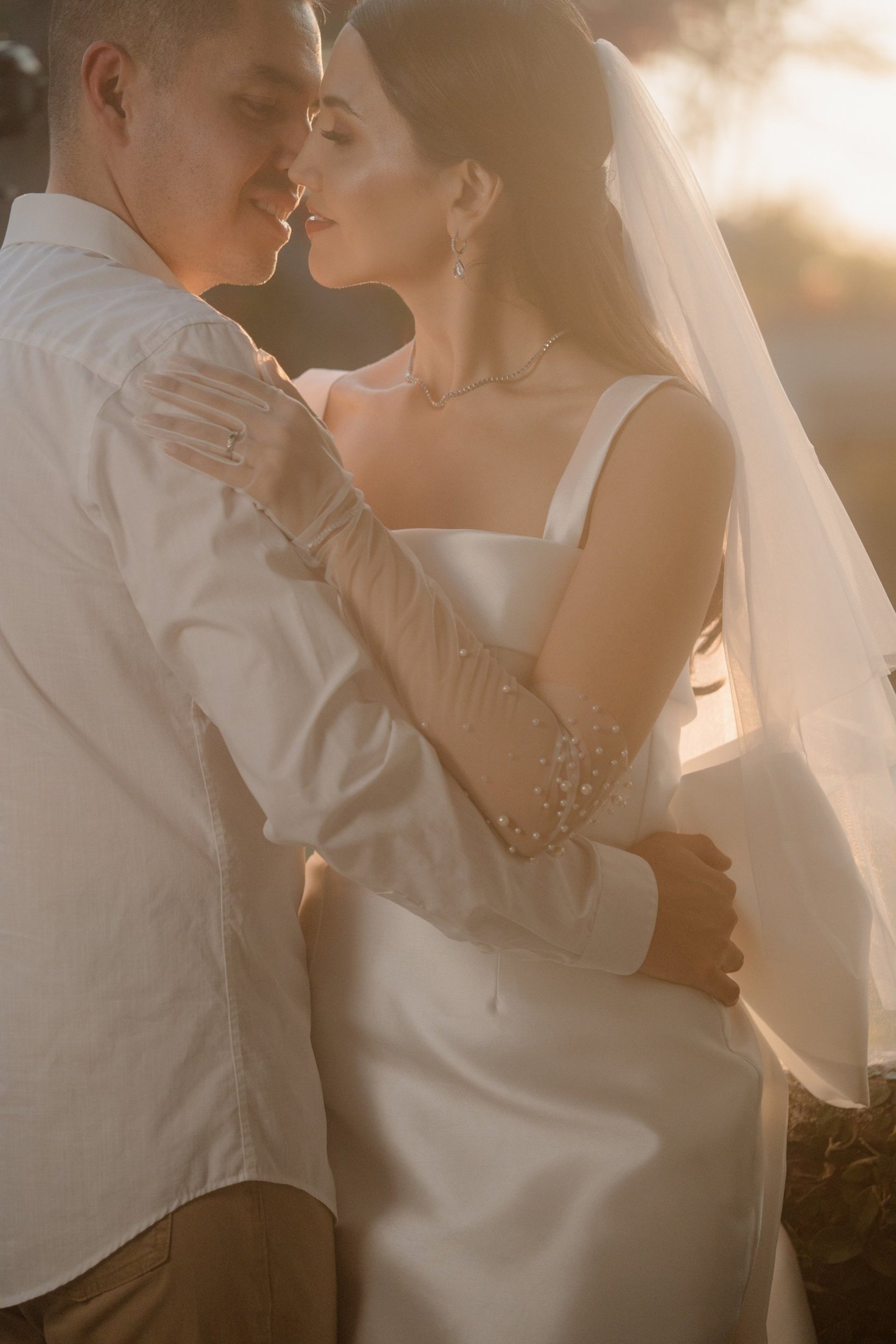 an abstract photo of a curved building with a blue sky in the background