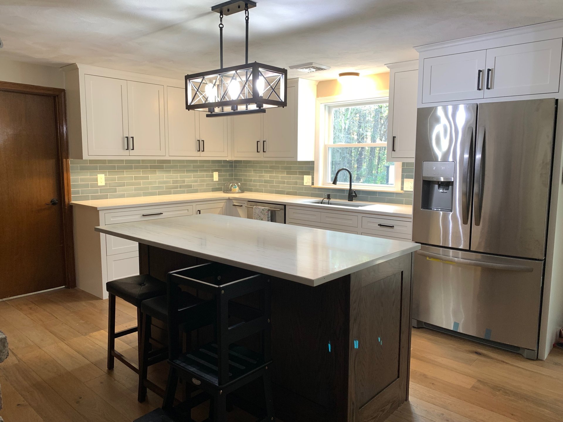 black and brown leather padded tub sofa