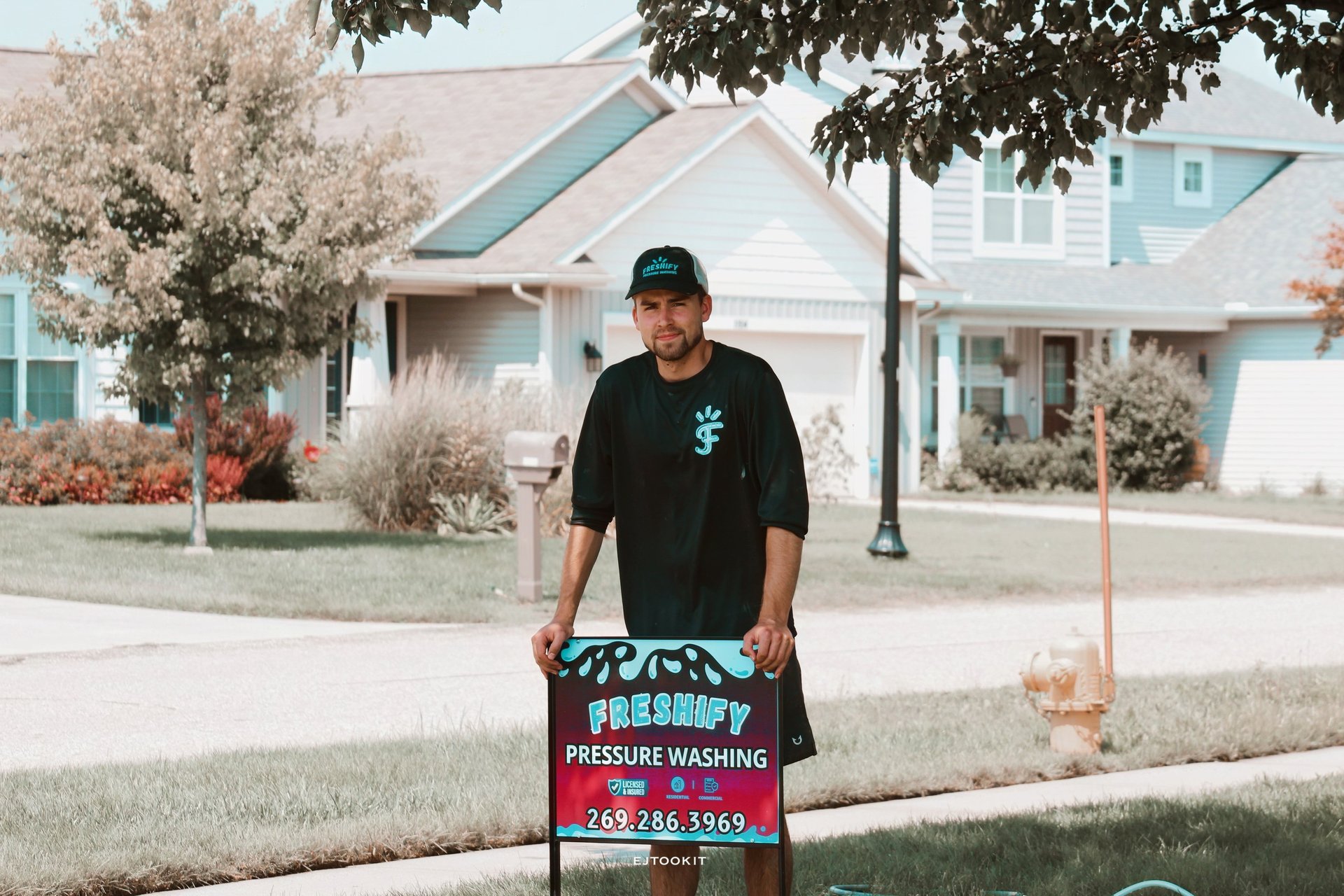 black and brown leather padded tub sofa