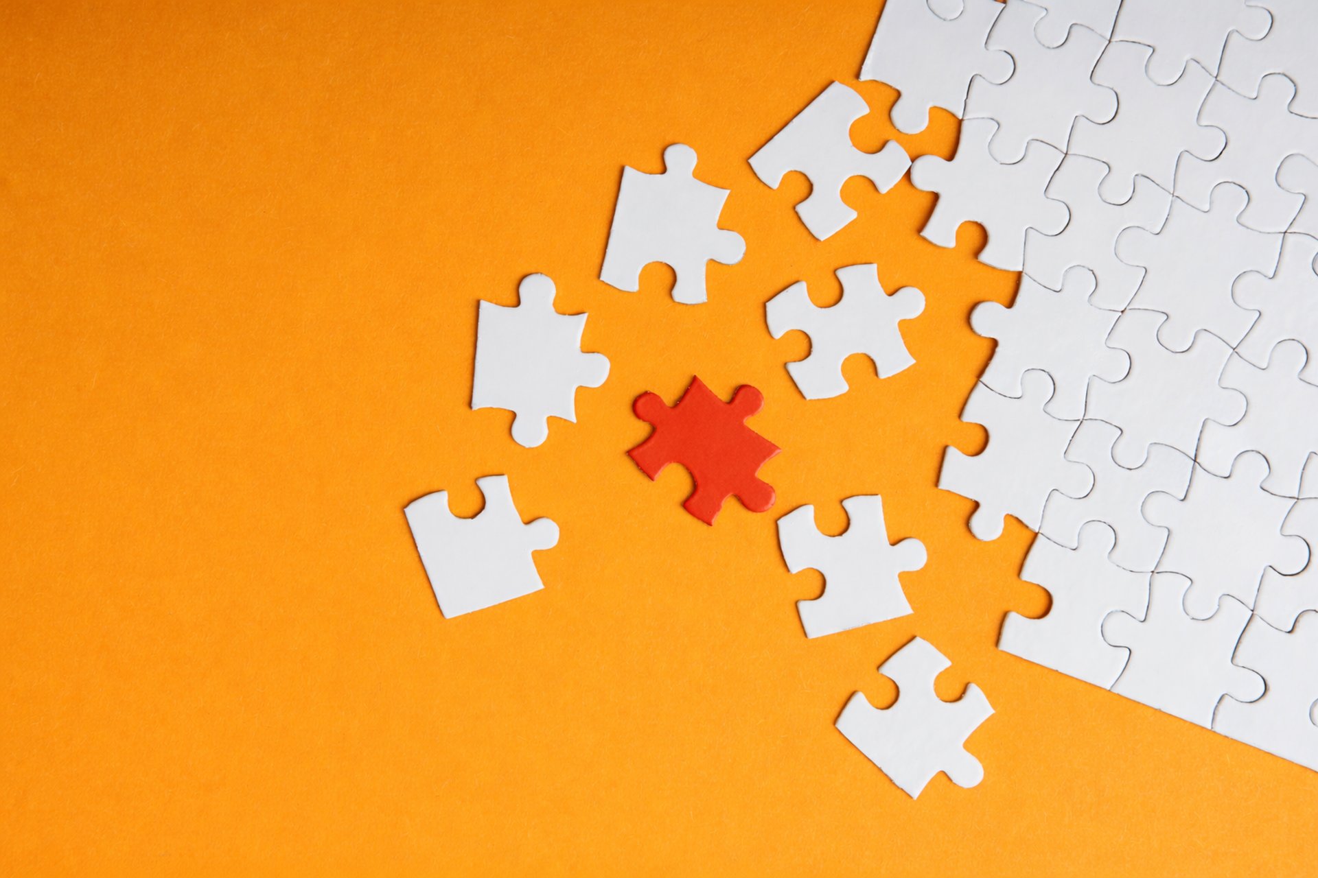 an abstract photo of a curved building with a blue sky in the background