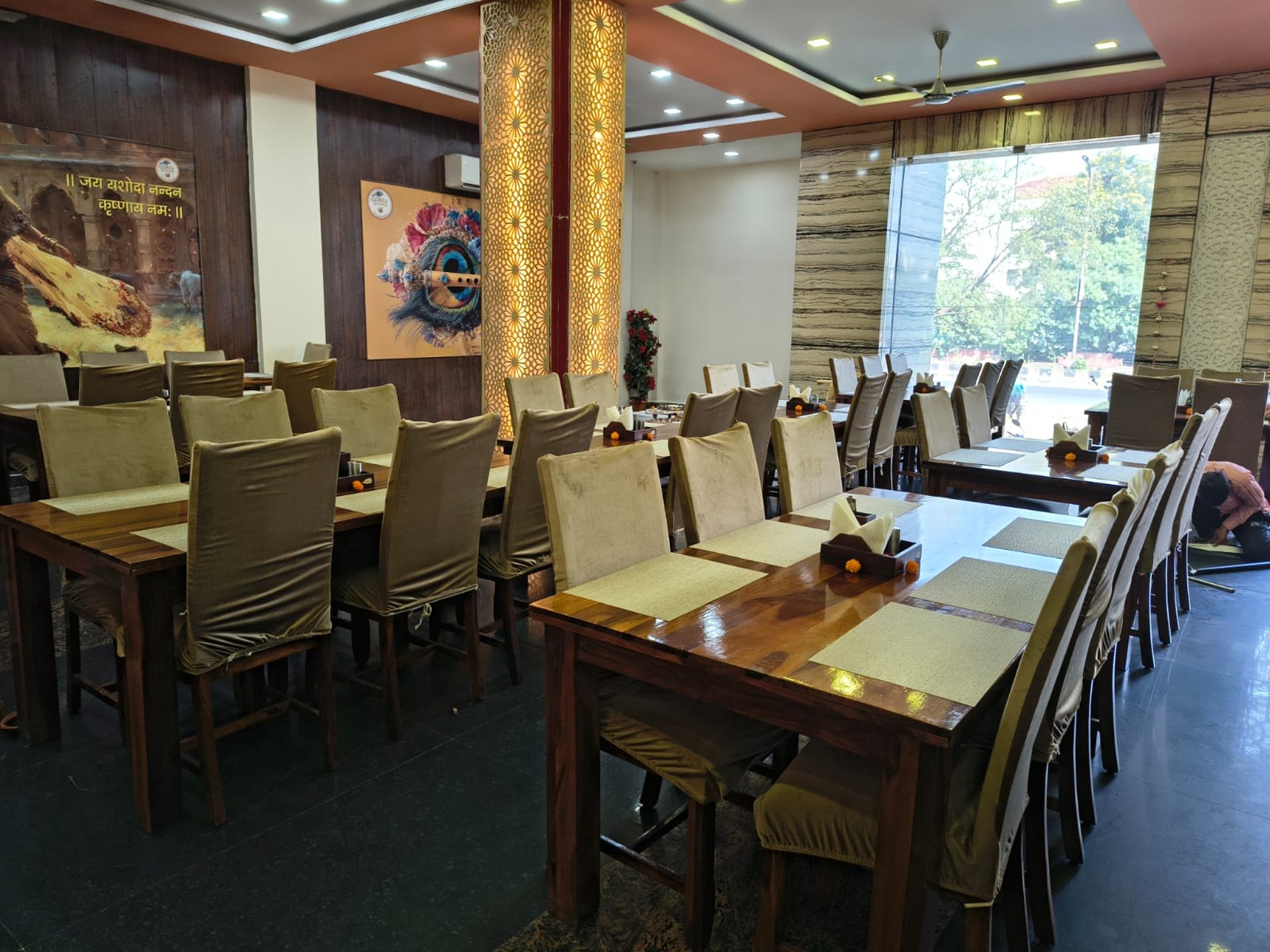 woman wearing yellow long-sleeved dress under white clouds and blue sky during daytime