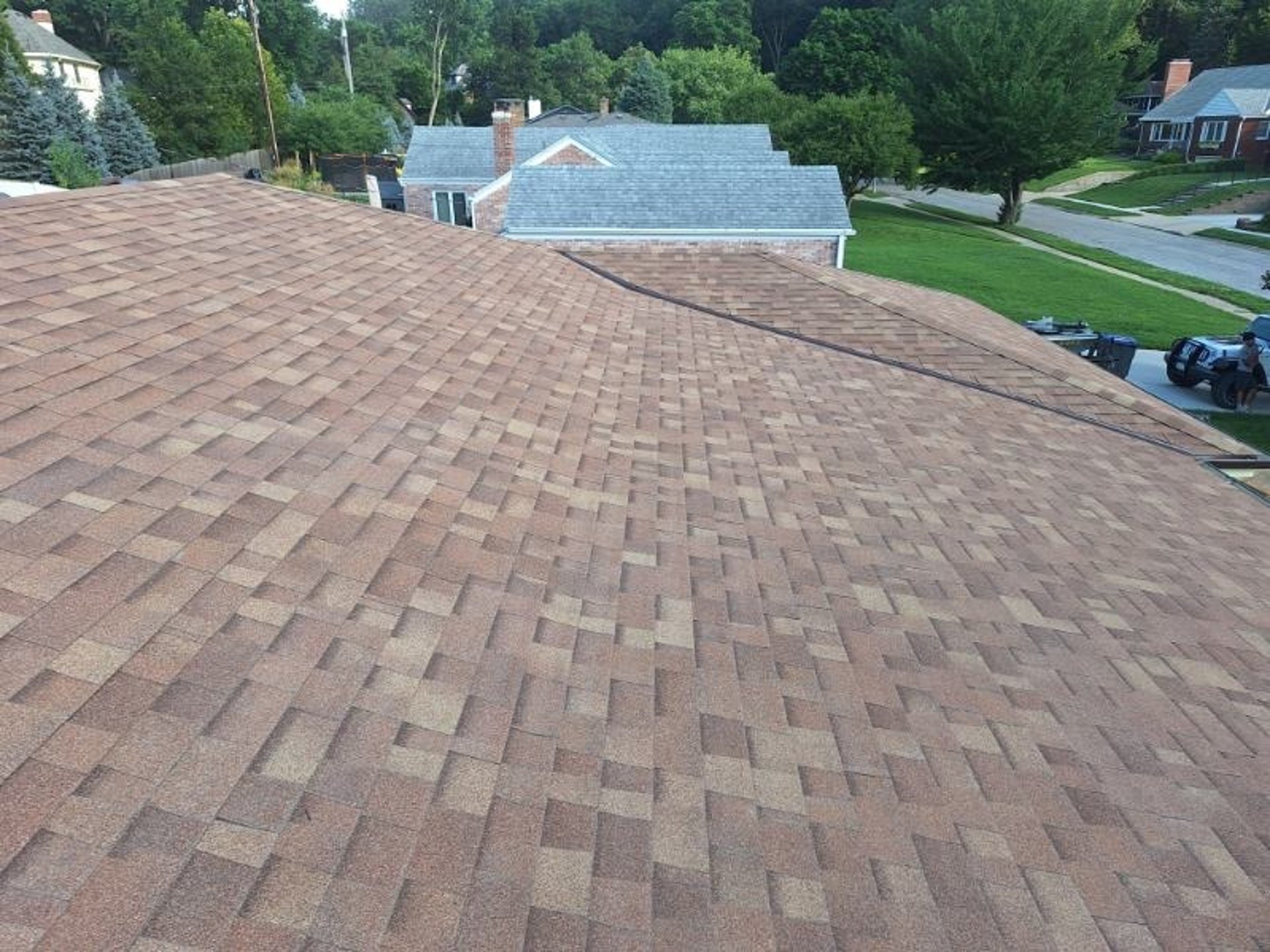 black and brown leather padded tub sofa