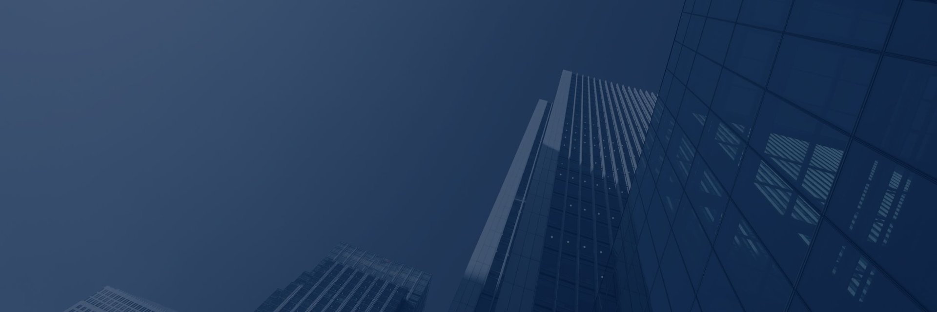 an office with a lot of desks and chairs