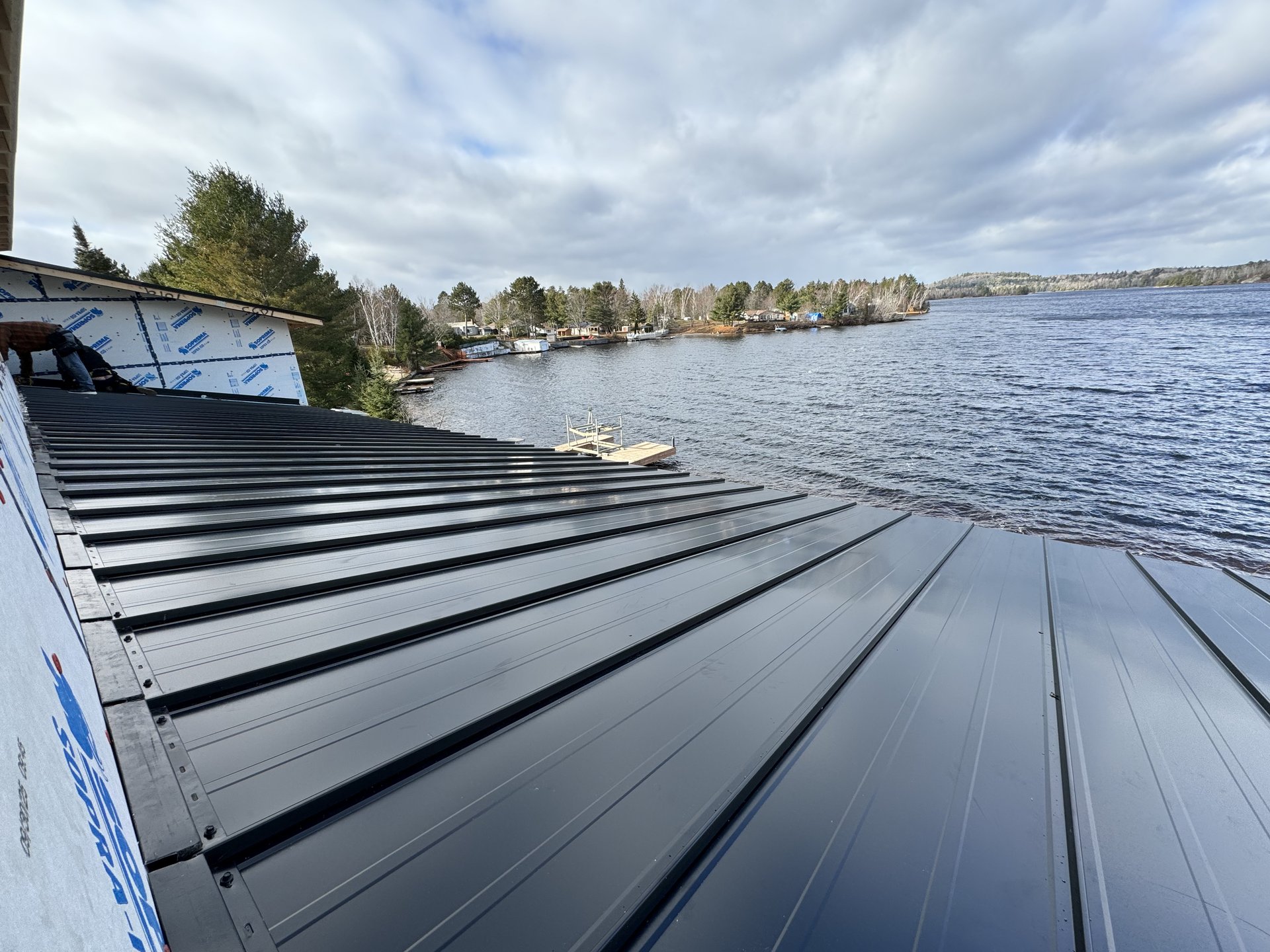 black and brown leather padded tub sofa