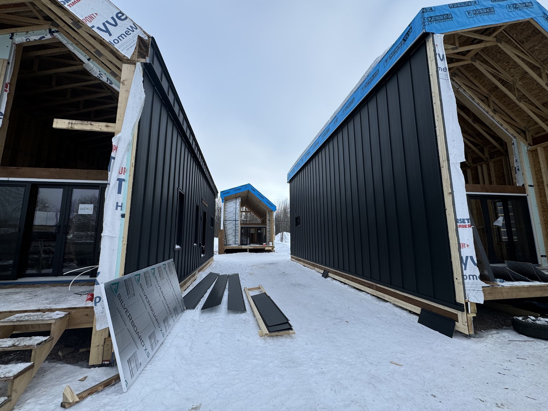 woman wearing yellow long-sleeved dress under white clouds and blue sky during daytime