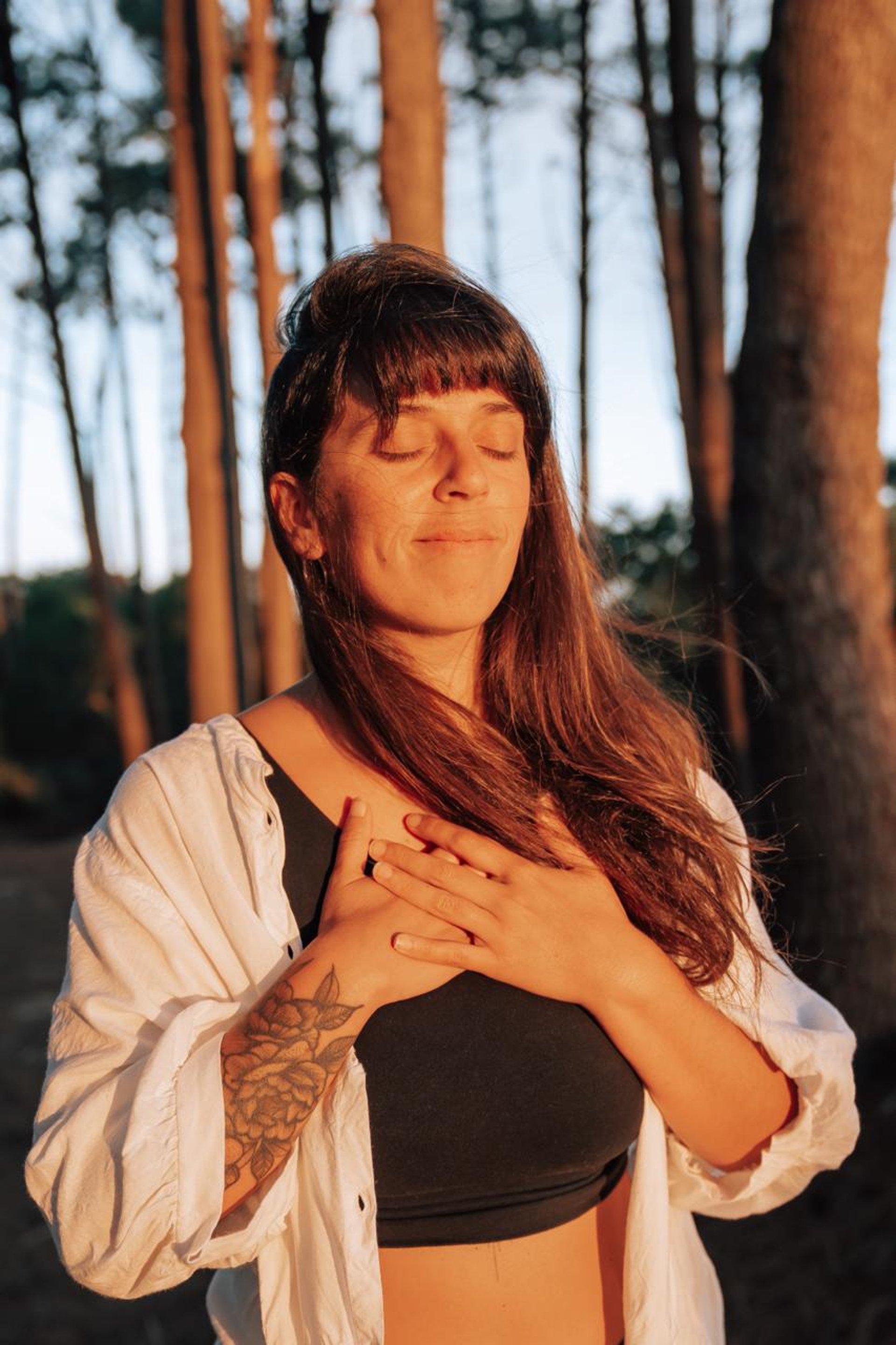 an abstract photo of a curved building with a blue sky in the background