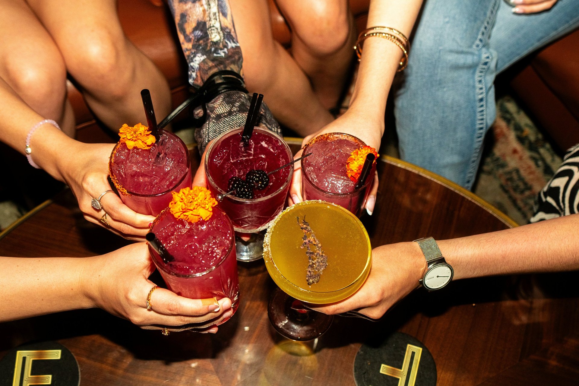 an abstract photo of a curved building with a blue sky in the background