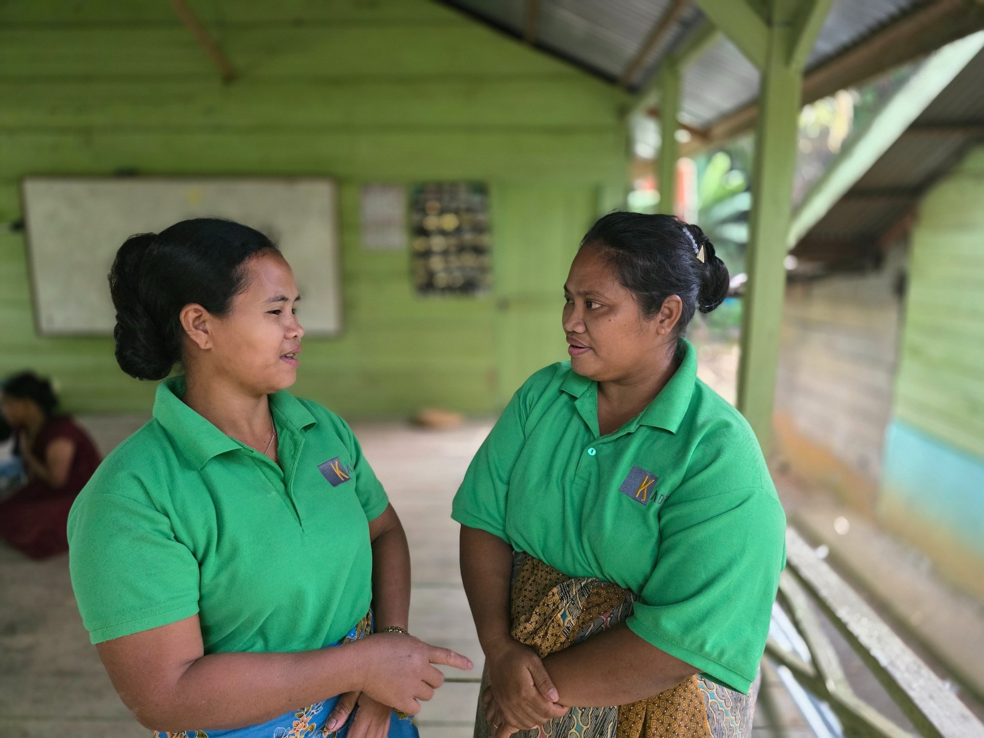 an abstract photo of a curved building with a blue sky in the background