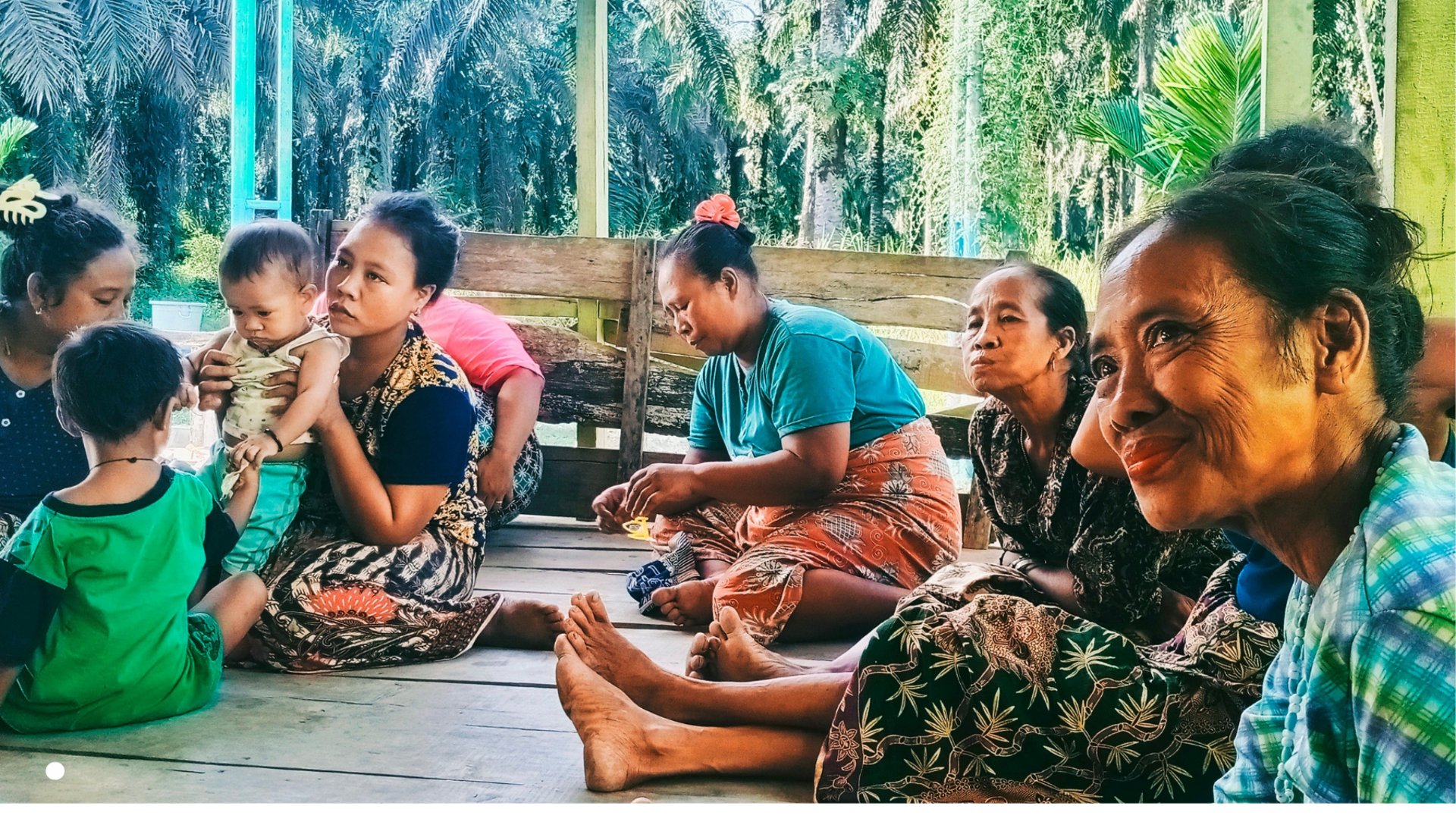 an abstract photo of a curved building with a blue sky in the background