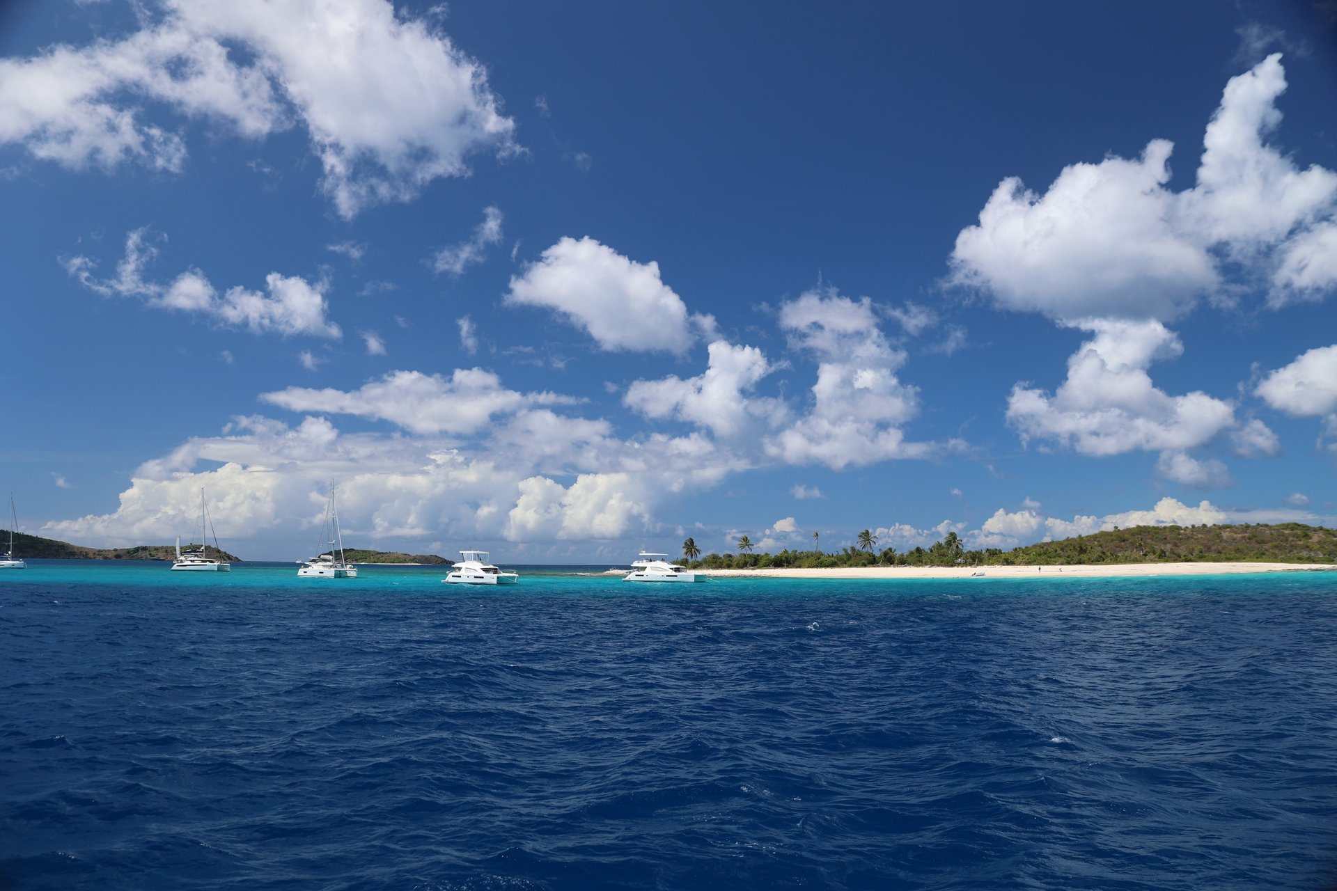 black and brown leather padded tub sofa