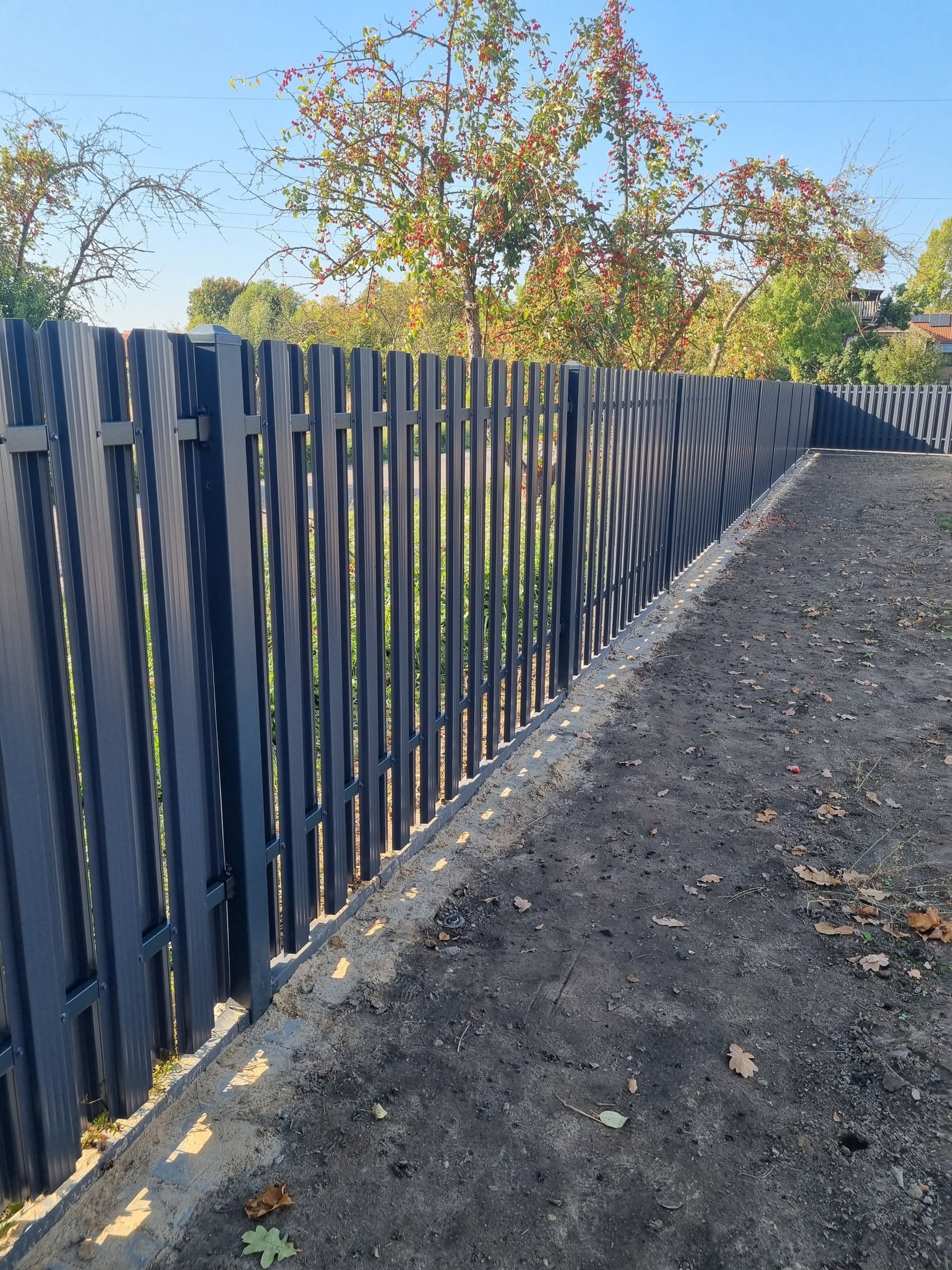 an abstract photo of a curved building with a blue sky in the background