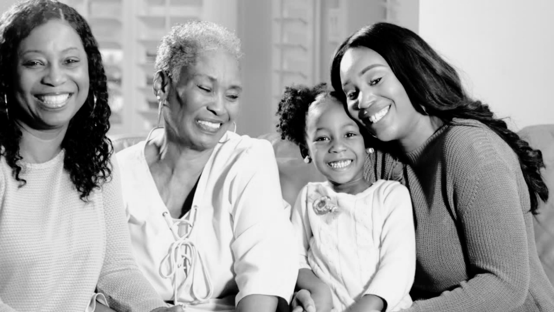 an abstract photo of a curved building with a blue sky in the background