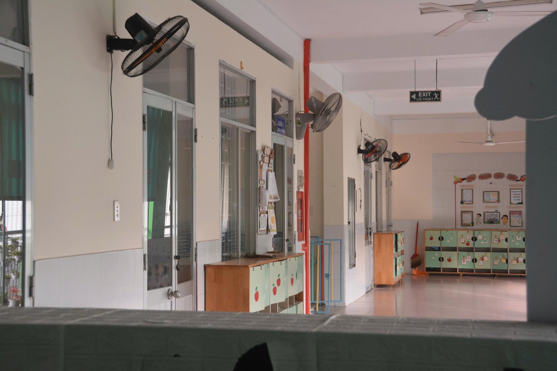 an abstract photo of a curved building with a blue sky in the background