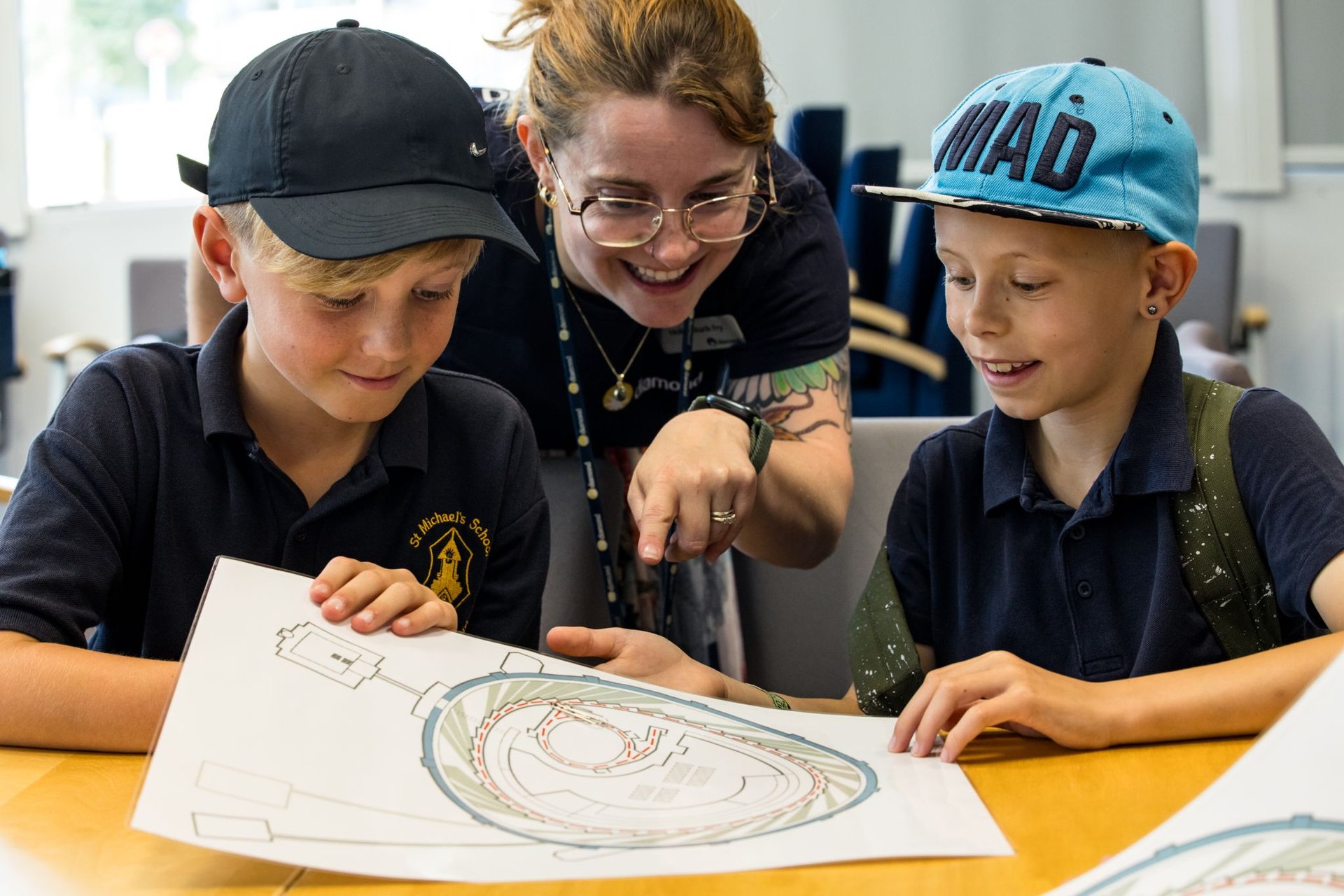 black and brown leather padded tub sofa