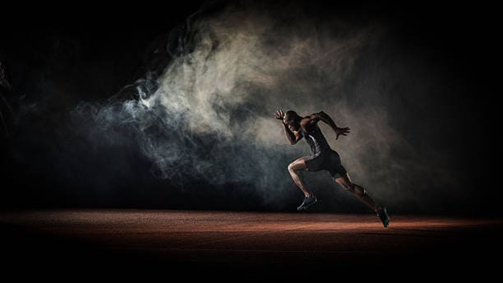 man on running field
