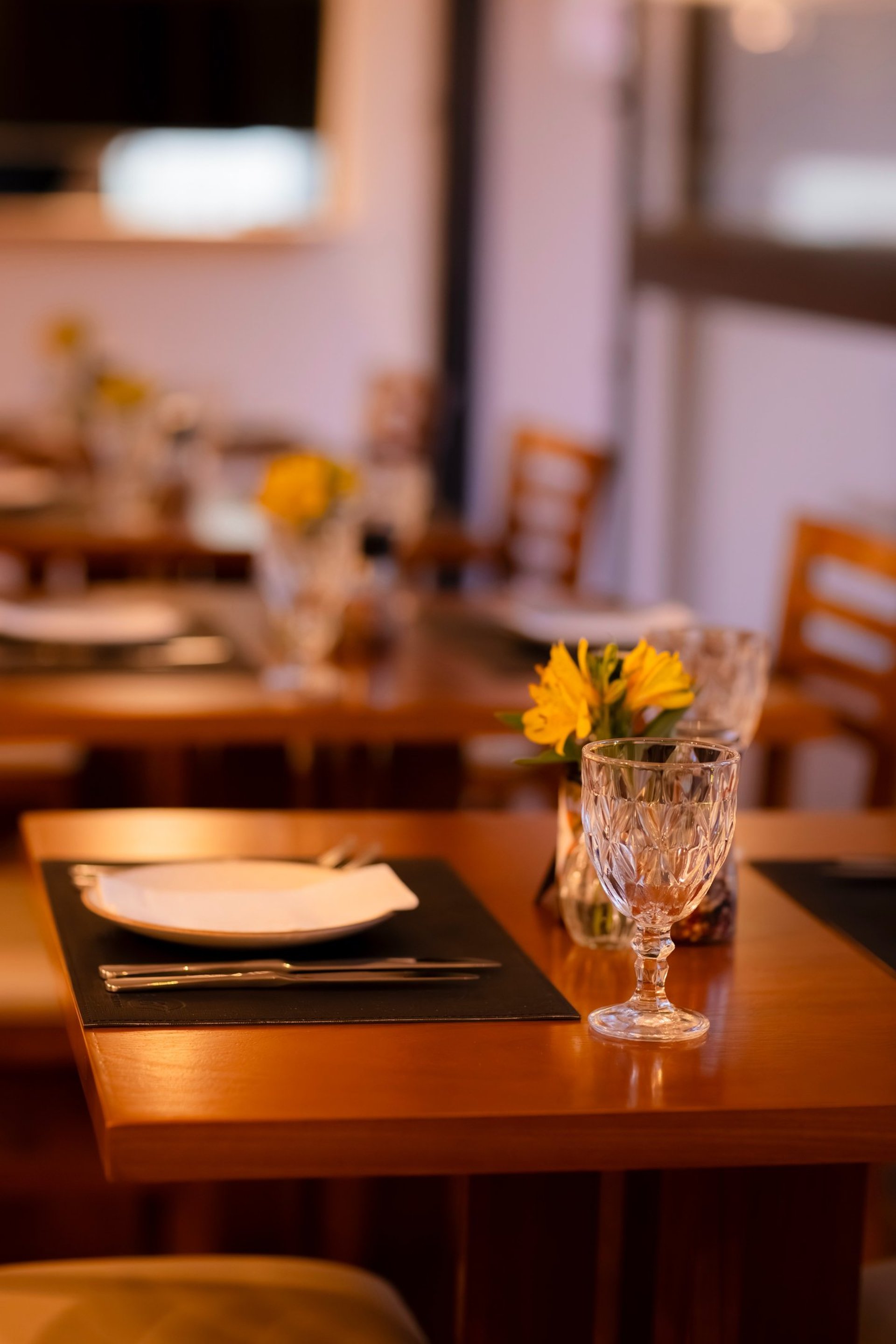 woman wearing yellow long-sleeved dress under white clouds and blue sky during daytime