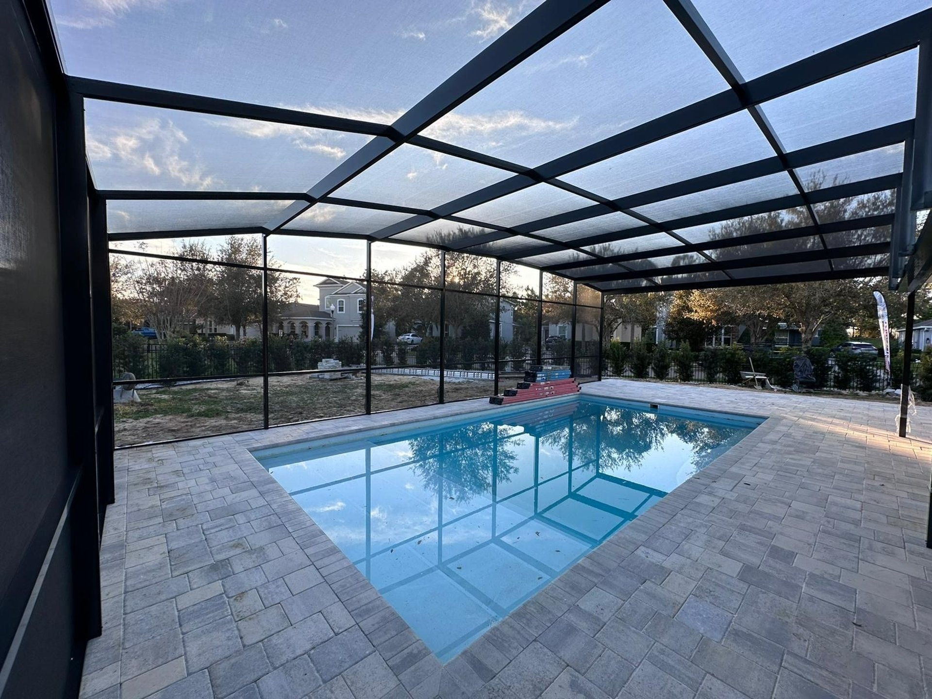 a living room filled with furniture and a flat screen tv