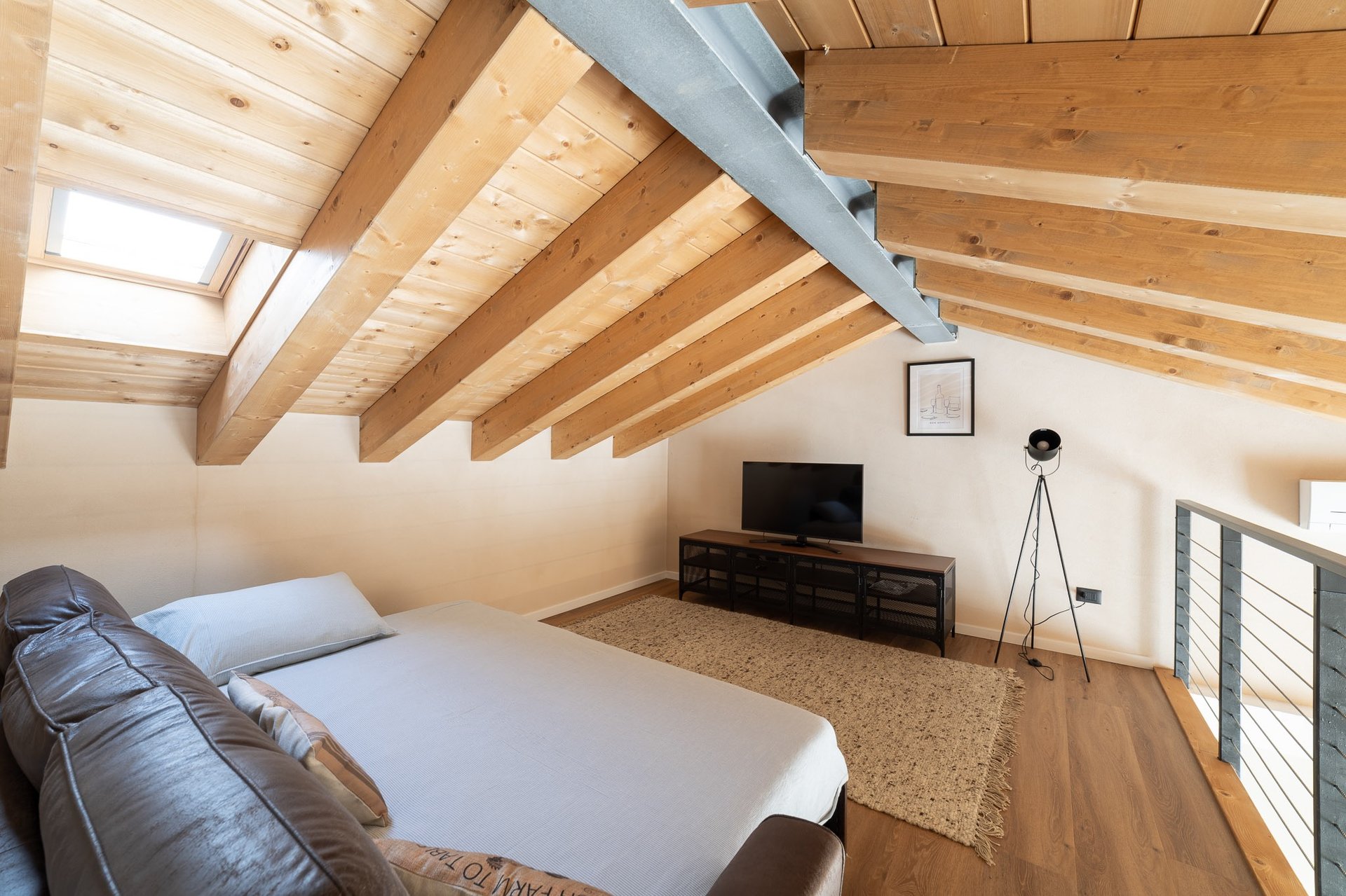an abstract photo of a curved building with a blue sky in the background
